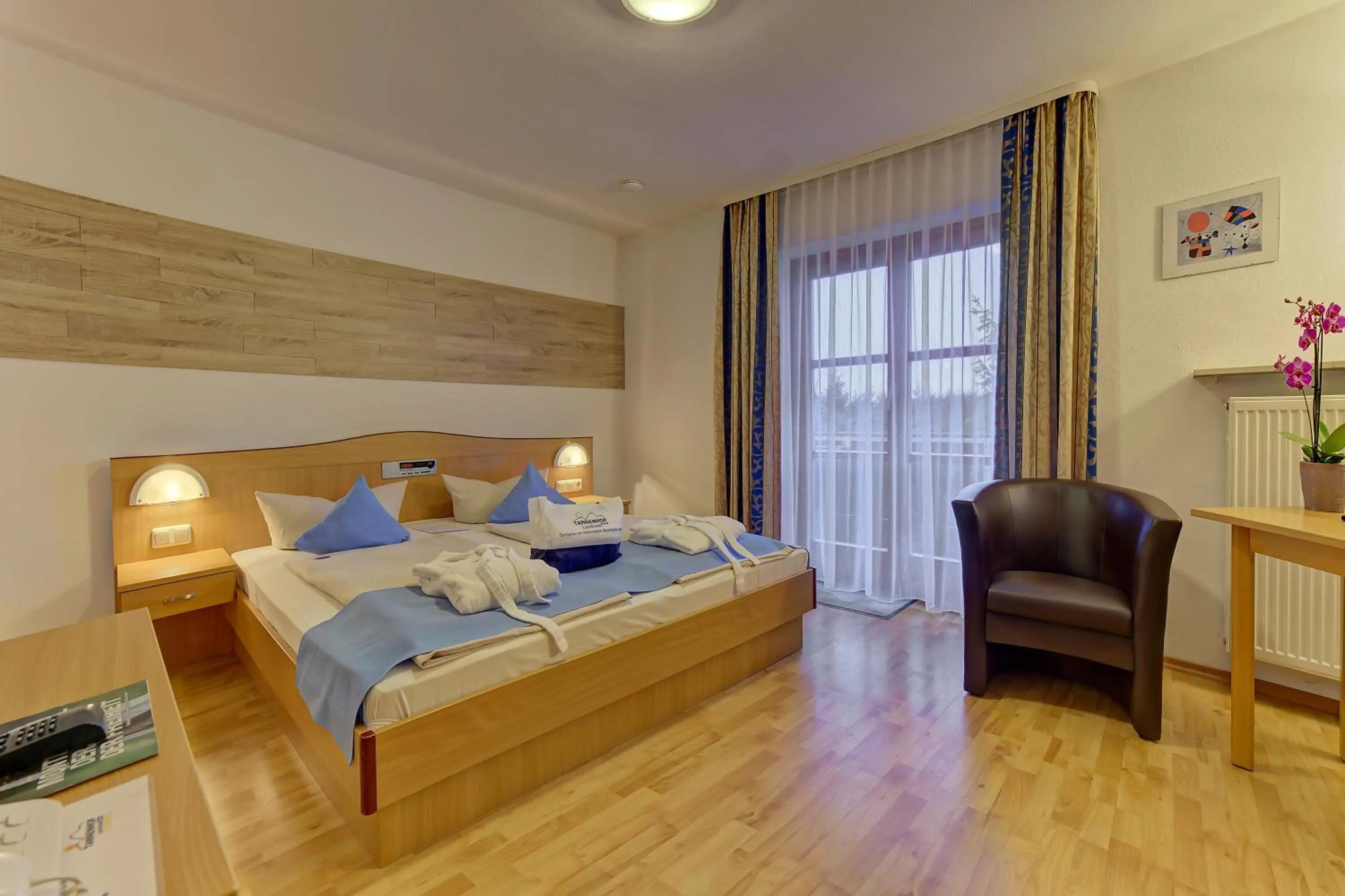 Living room, Bed in Landhotel Tannenhof