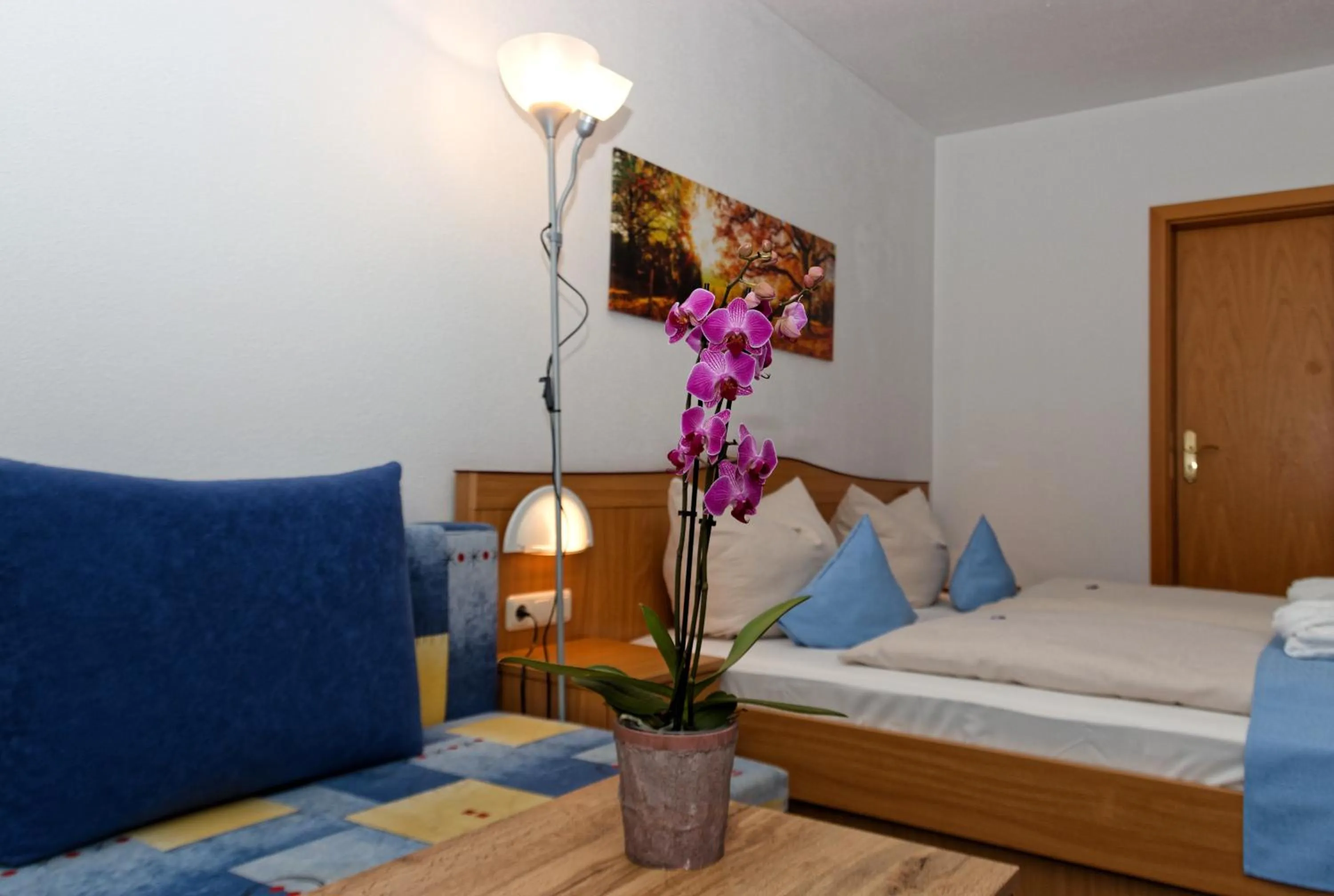 Living room, Bed in Landhotel Tannenhof