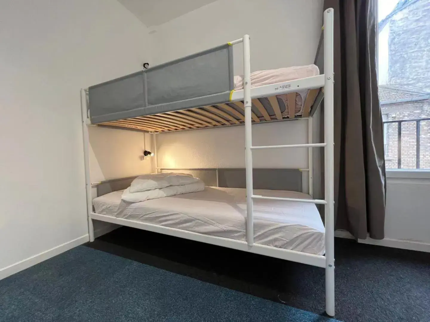 Bed in 4-Bed Female Dormitory Room in Le Coffice Auberge de Jeunesse Bed in 4-Bed Female Dormitory Room in Le Coffice Auberge de Jeunesse