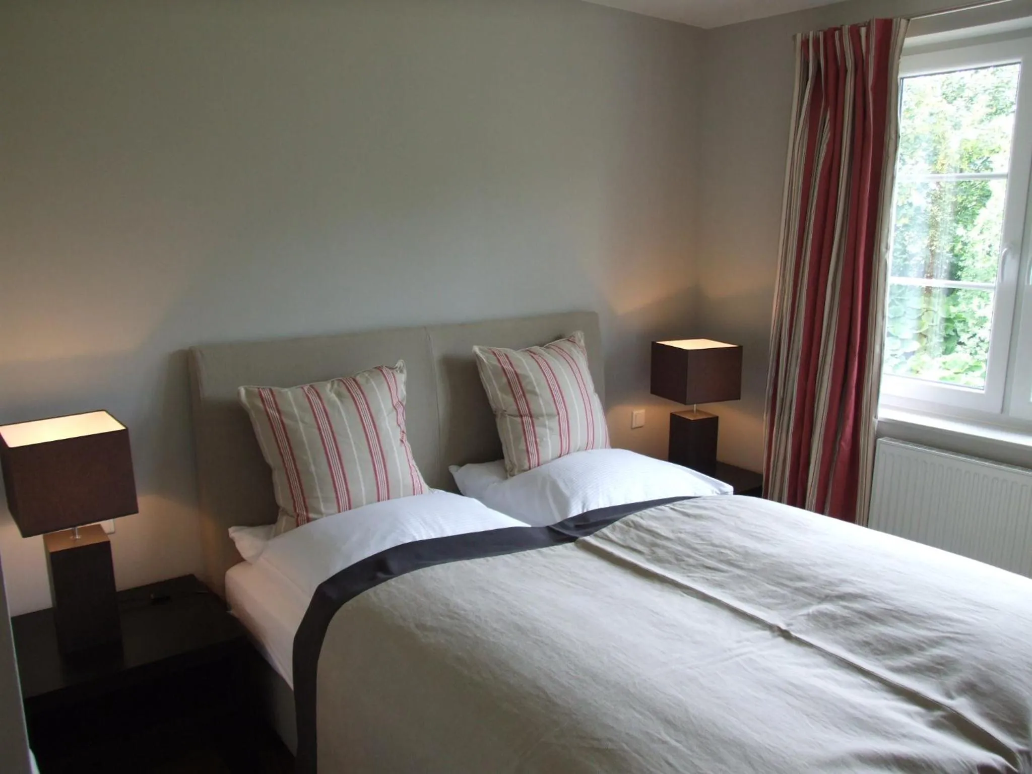 Bed in AUSZEIT Hotel