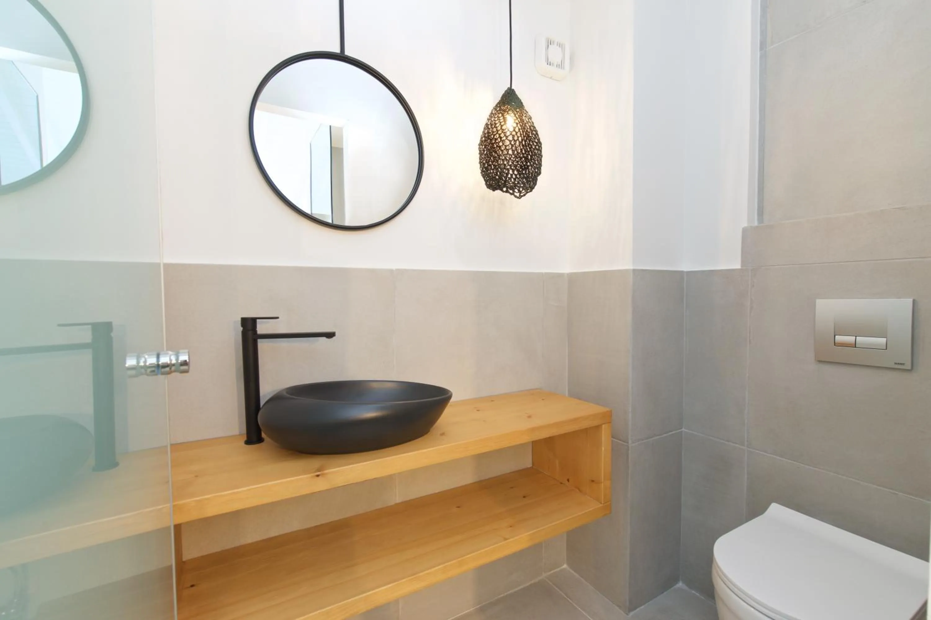 Toilet in Alancia Suites