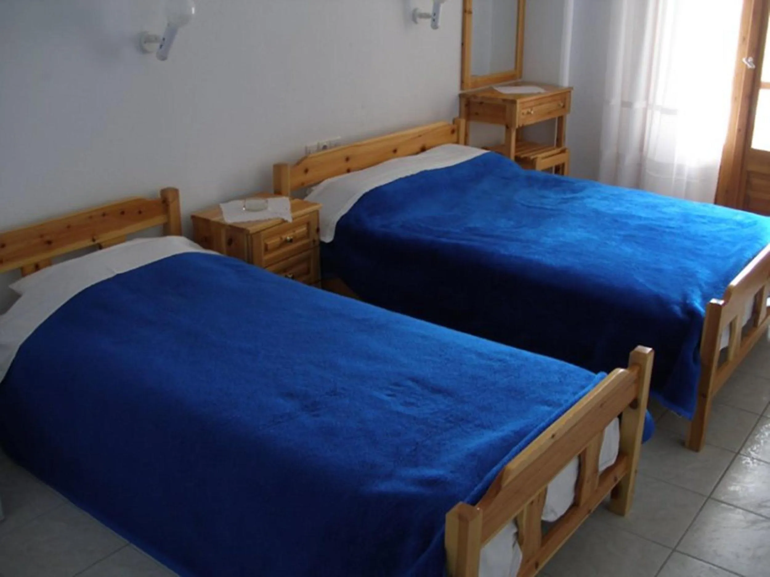 Bed in Hotel Alexandros