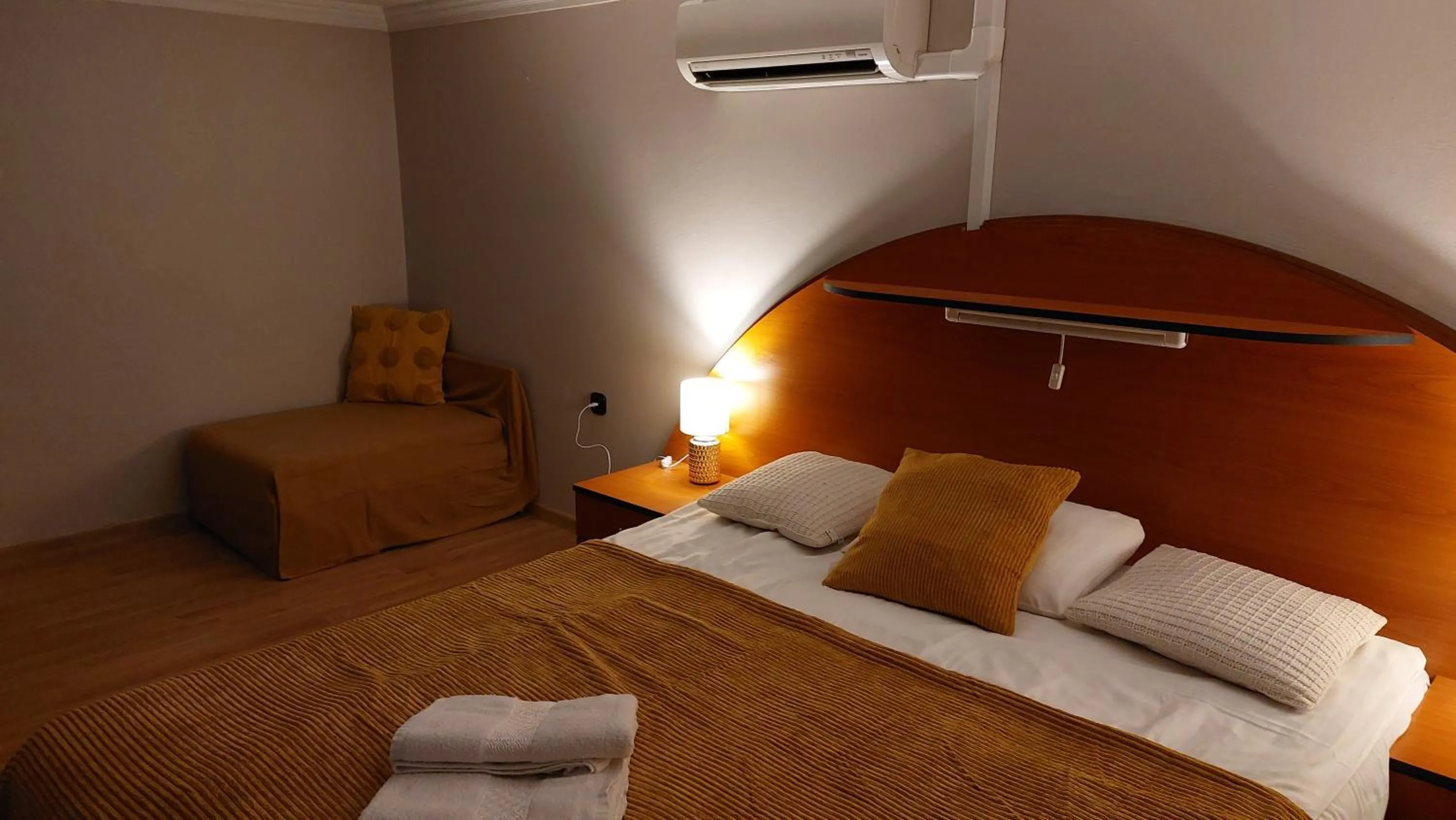 Bed in Family Apartman