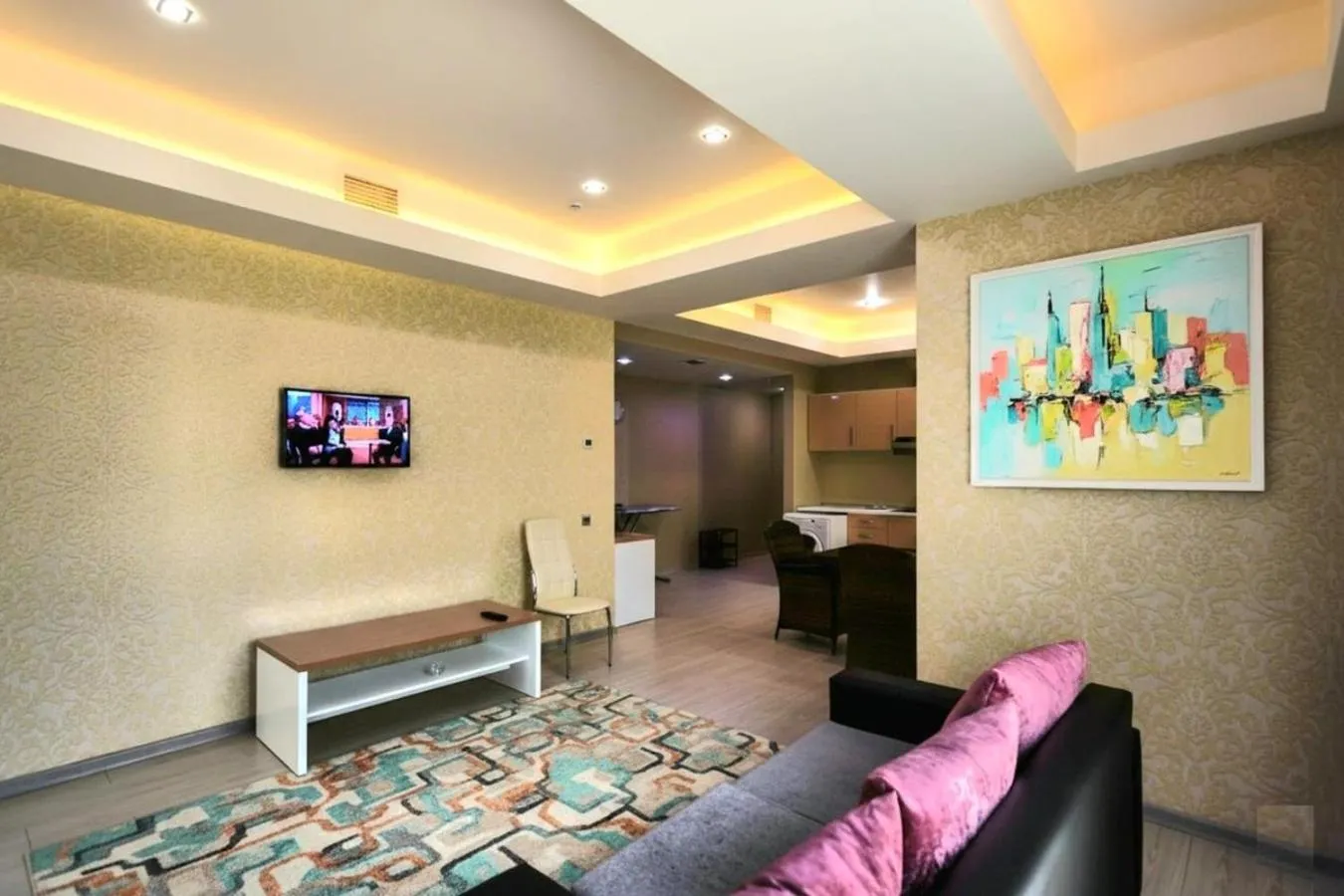 Communal lounge/ TV room in Diplomat Suites Hotel