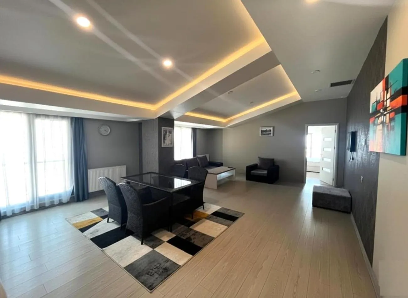 Communal lounge/ TV room in Diplomat Suites Hotel