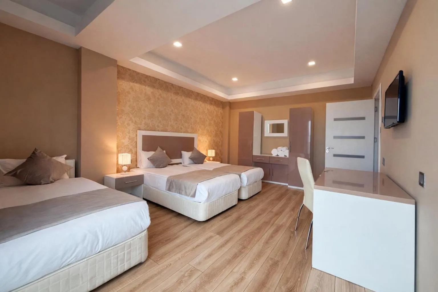 Bed in Diplomat Suites Hotel