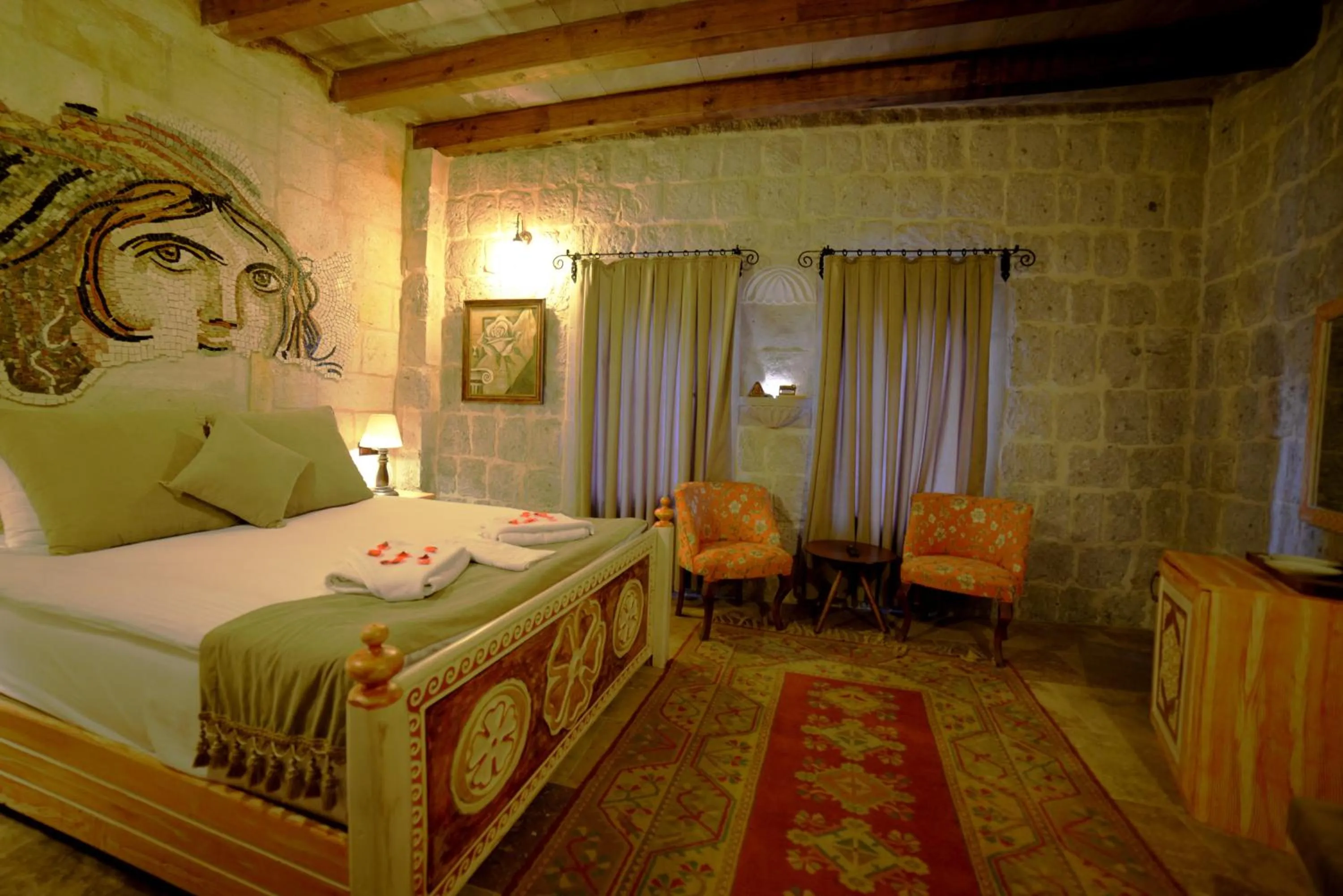 Bedroom, Bed in Caftan Cave Suites