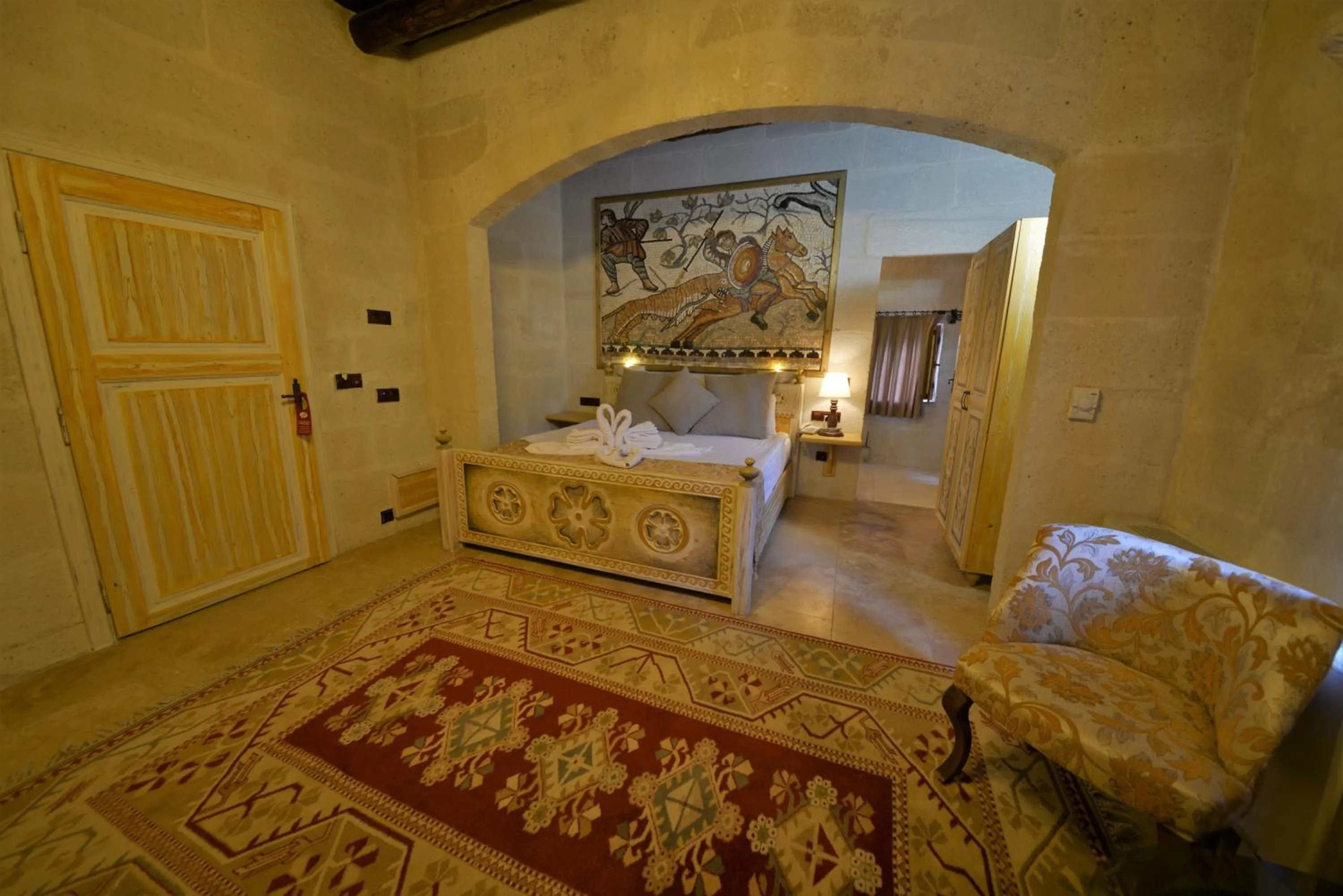 Bedroom, Bed in Caftan Cave Suites