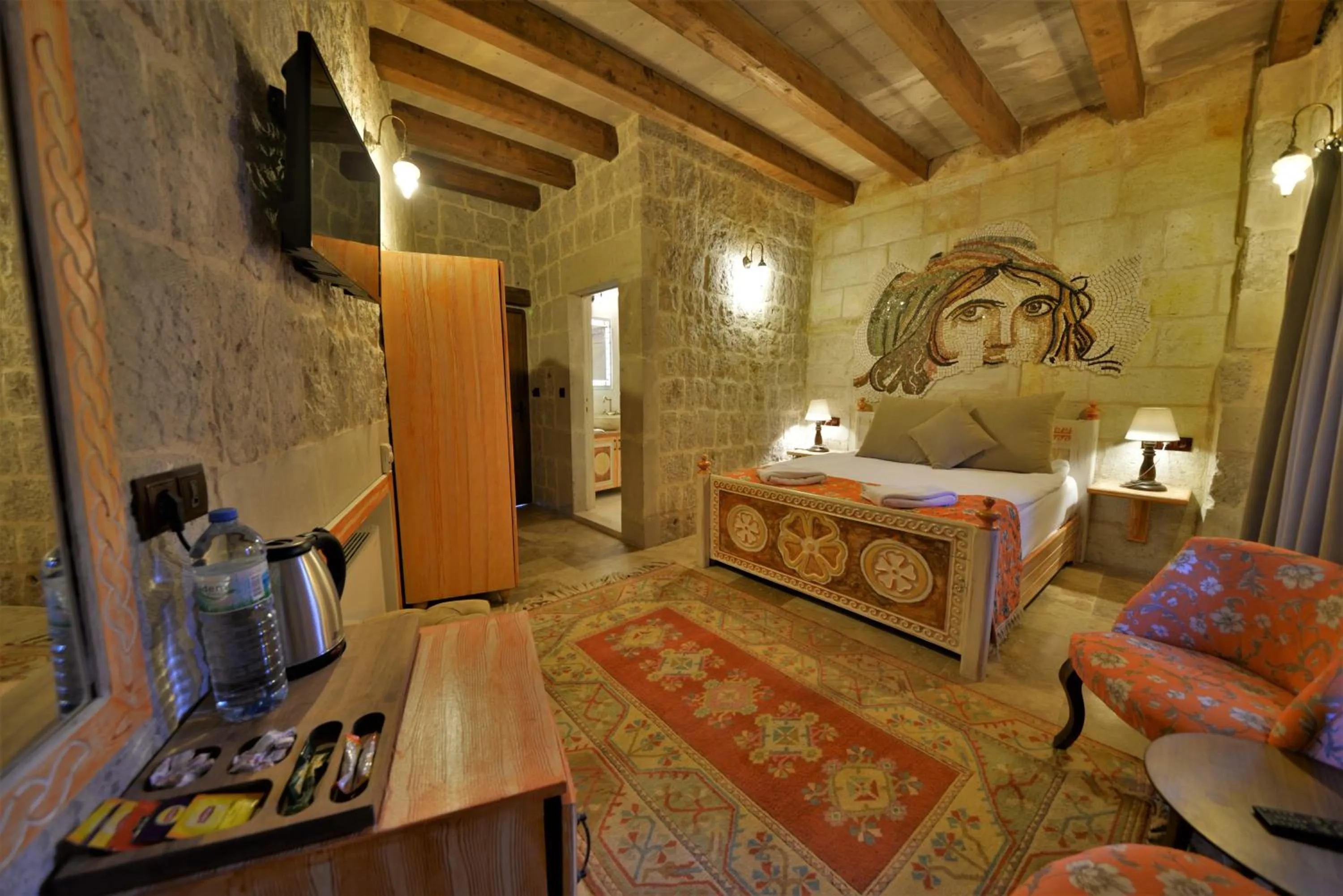 Bedroom, Bed in Caftan Cave Suites