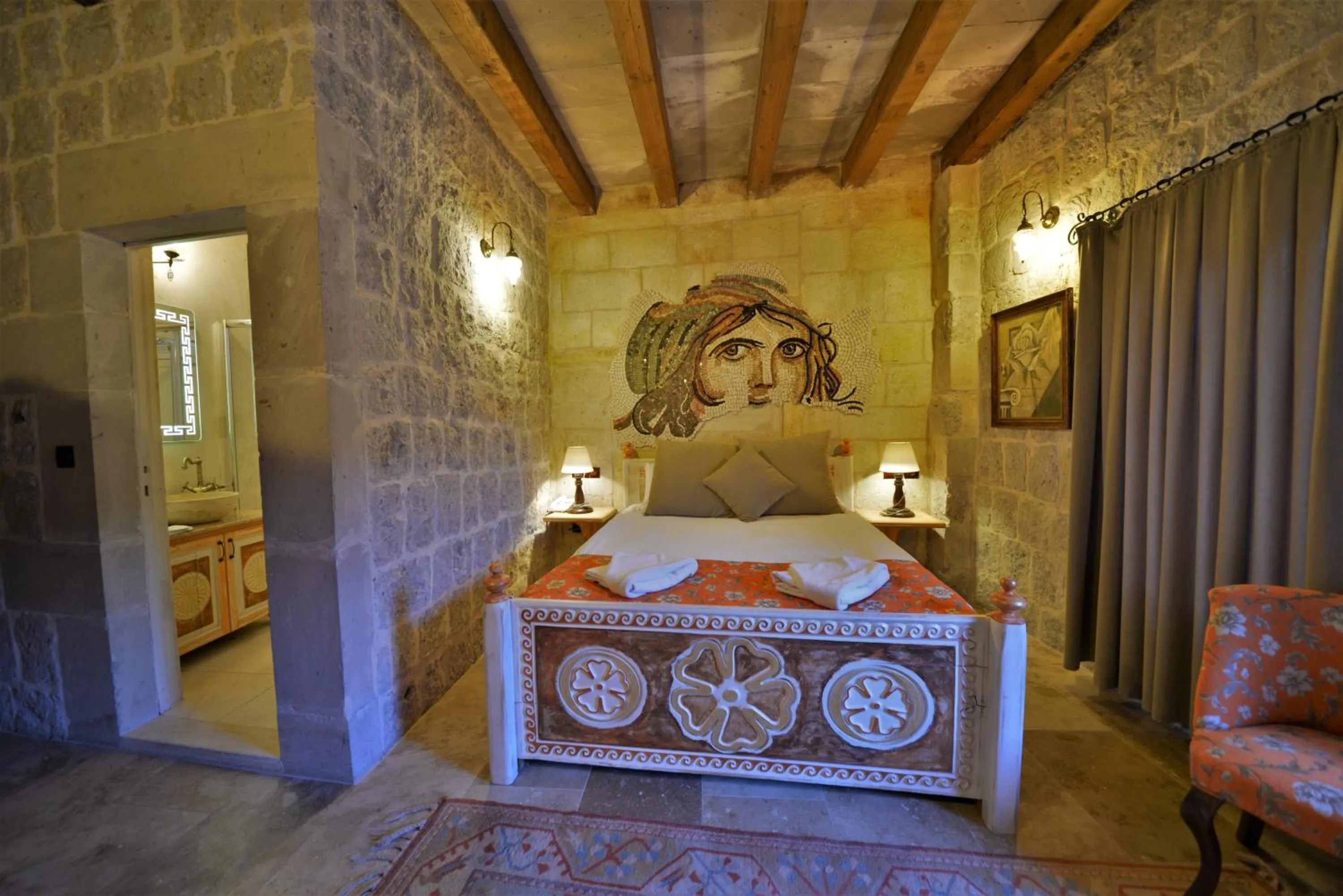Bedroom, Bed in Caftan Cave Suites
