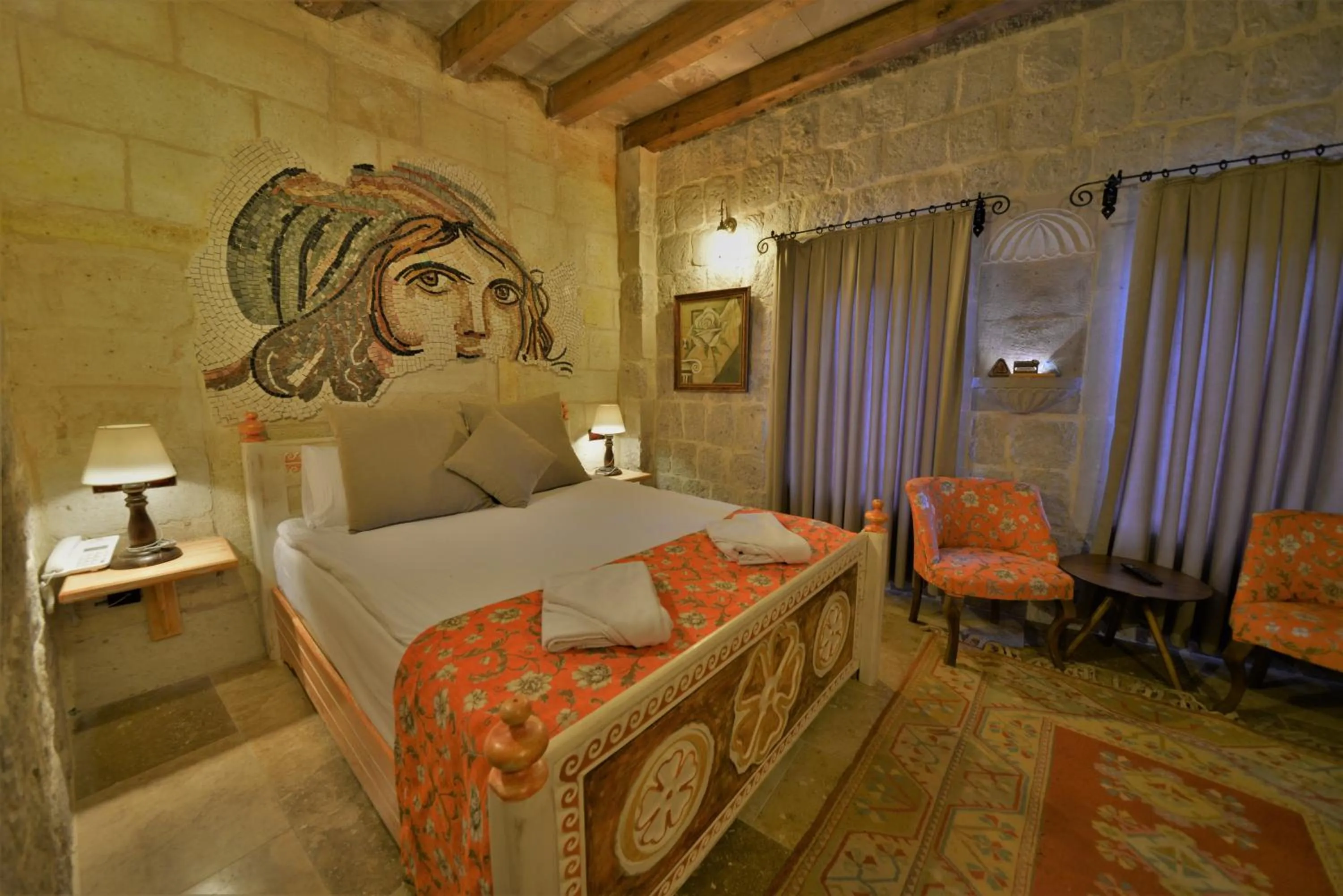 Bedroom, Bed in Caftan Cave Suites