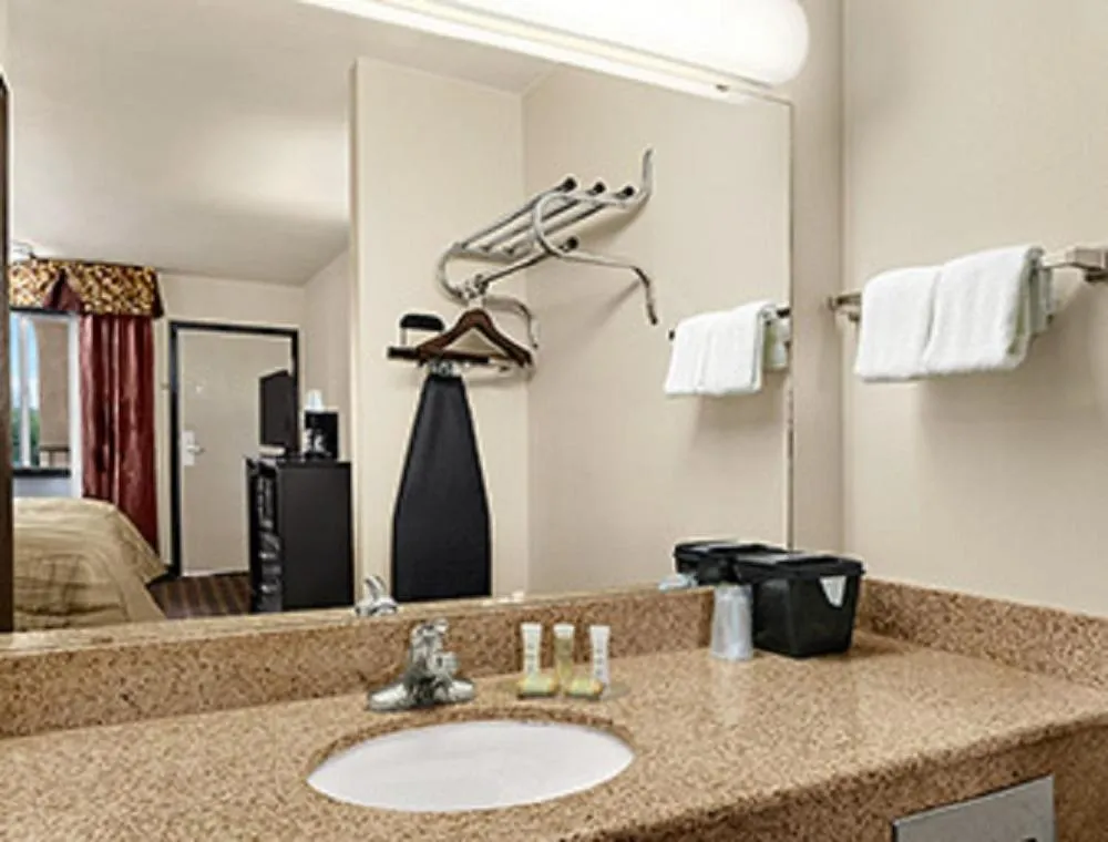 Bathroom in Super 8 by Wyndham Fort Worth TX