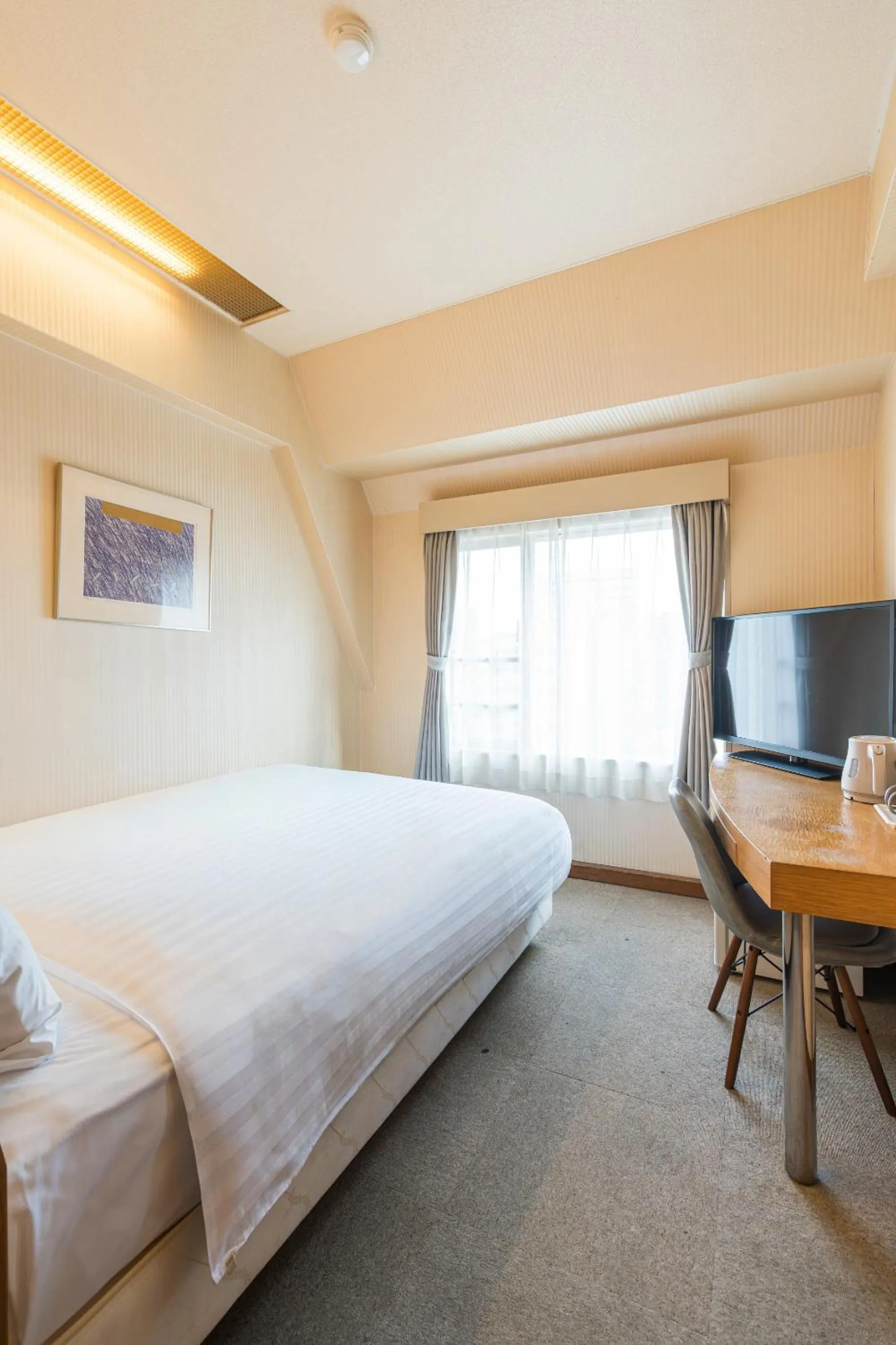 Bed in Court Hotel Fukuoka Tenjin