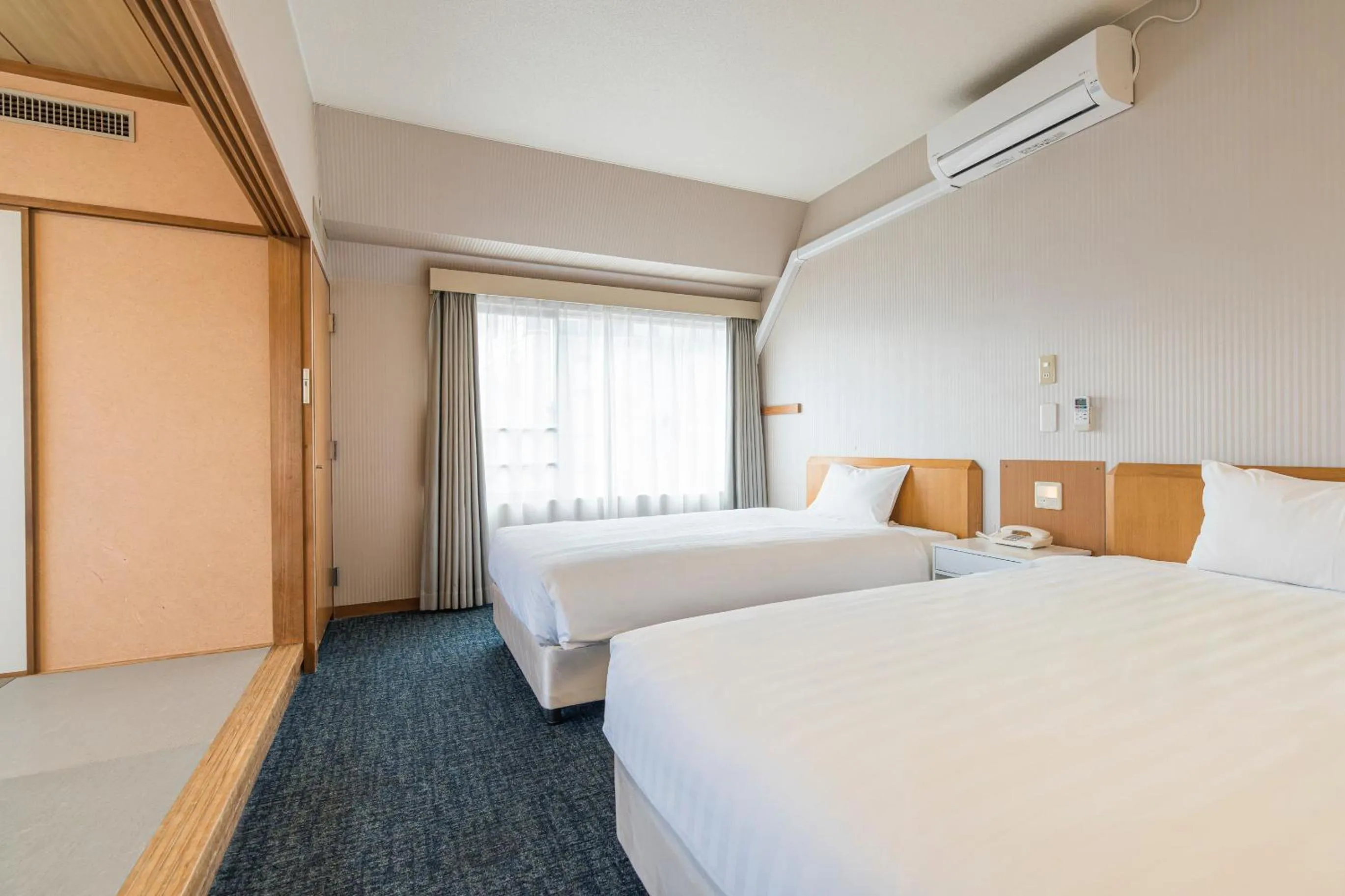 Bed in Court Hotel Fukuoka Tenjin