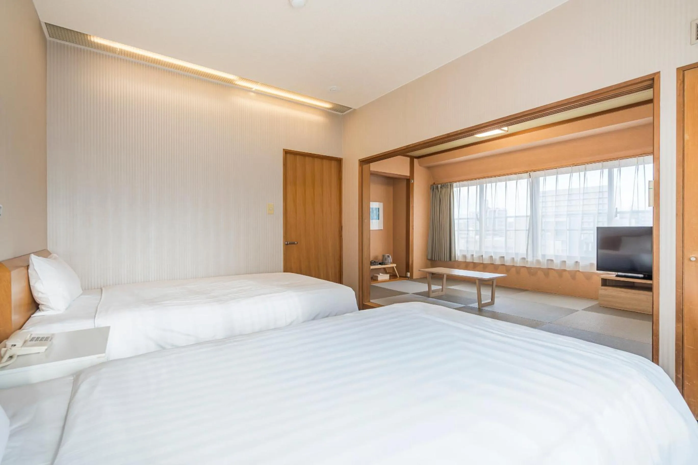 Bed in Court Hotel Fukuoka Tenjin