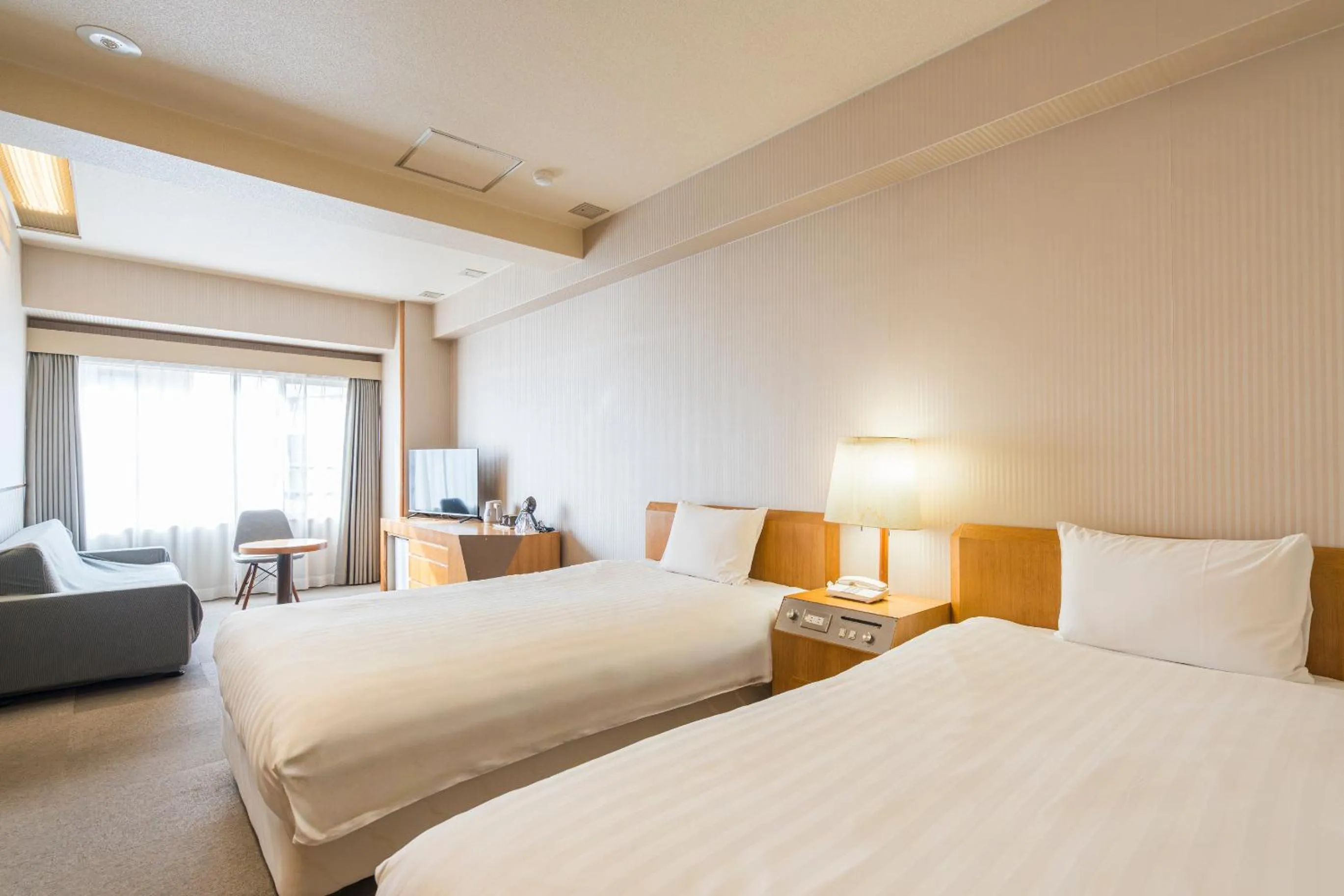 Bed in Court Hotel Fukuoka Tenjin
