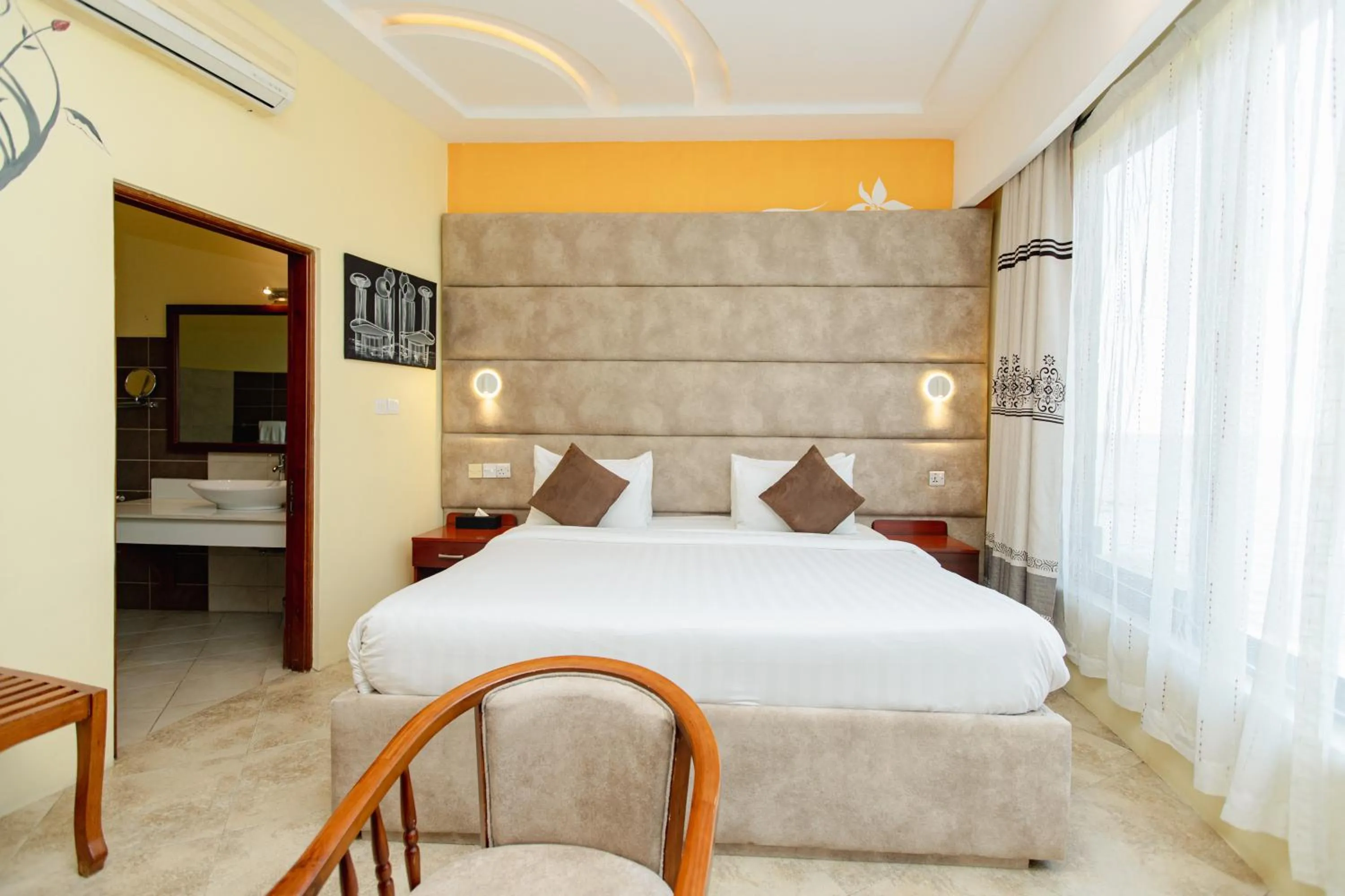 Bed in Malaika Beach Resort