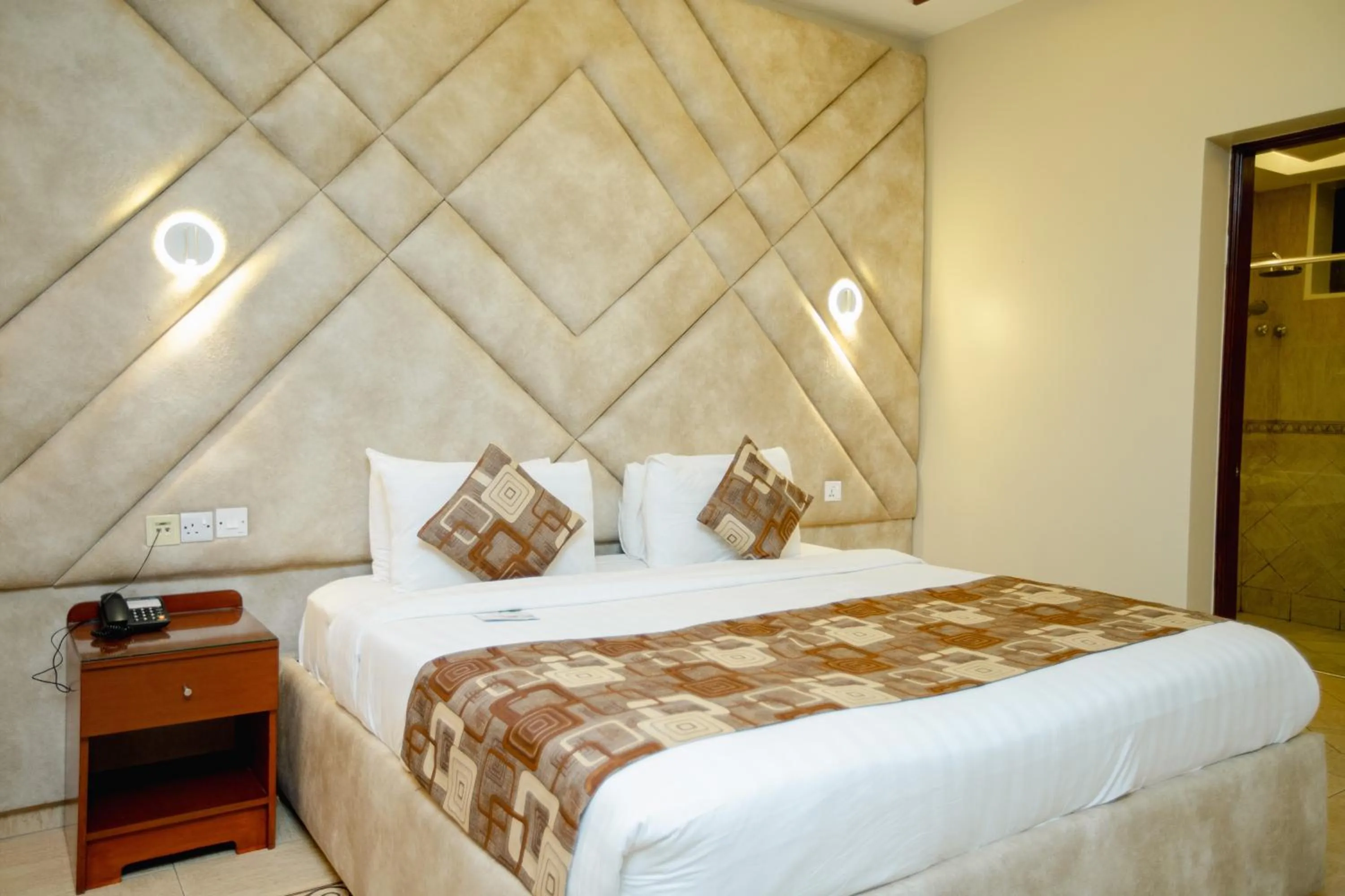 Bed in Malaika Beach Resort