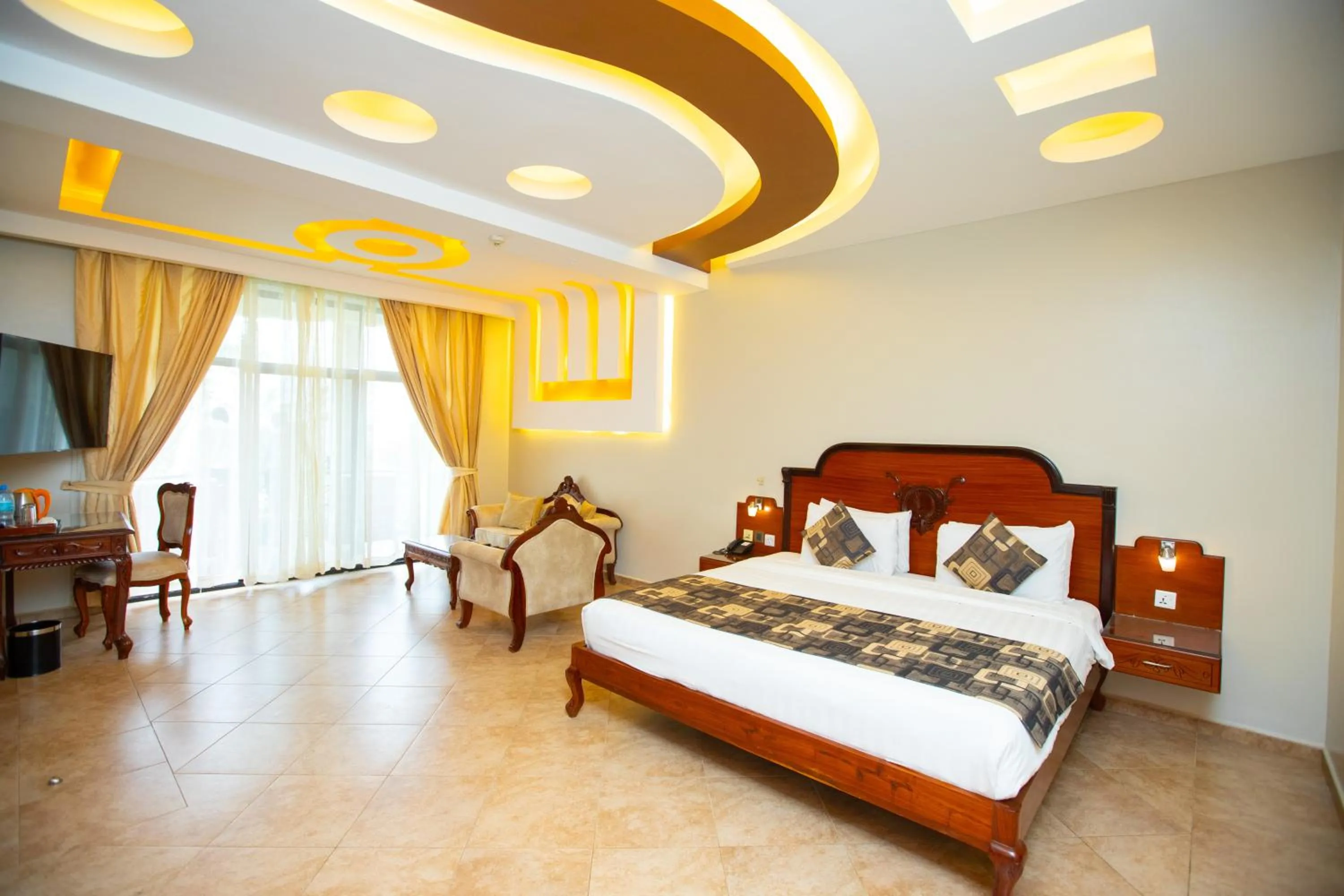 Bed in Malaika Beach Resort