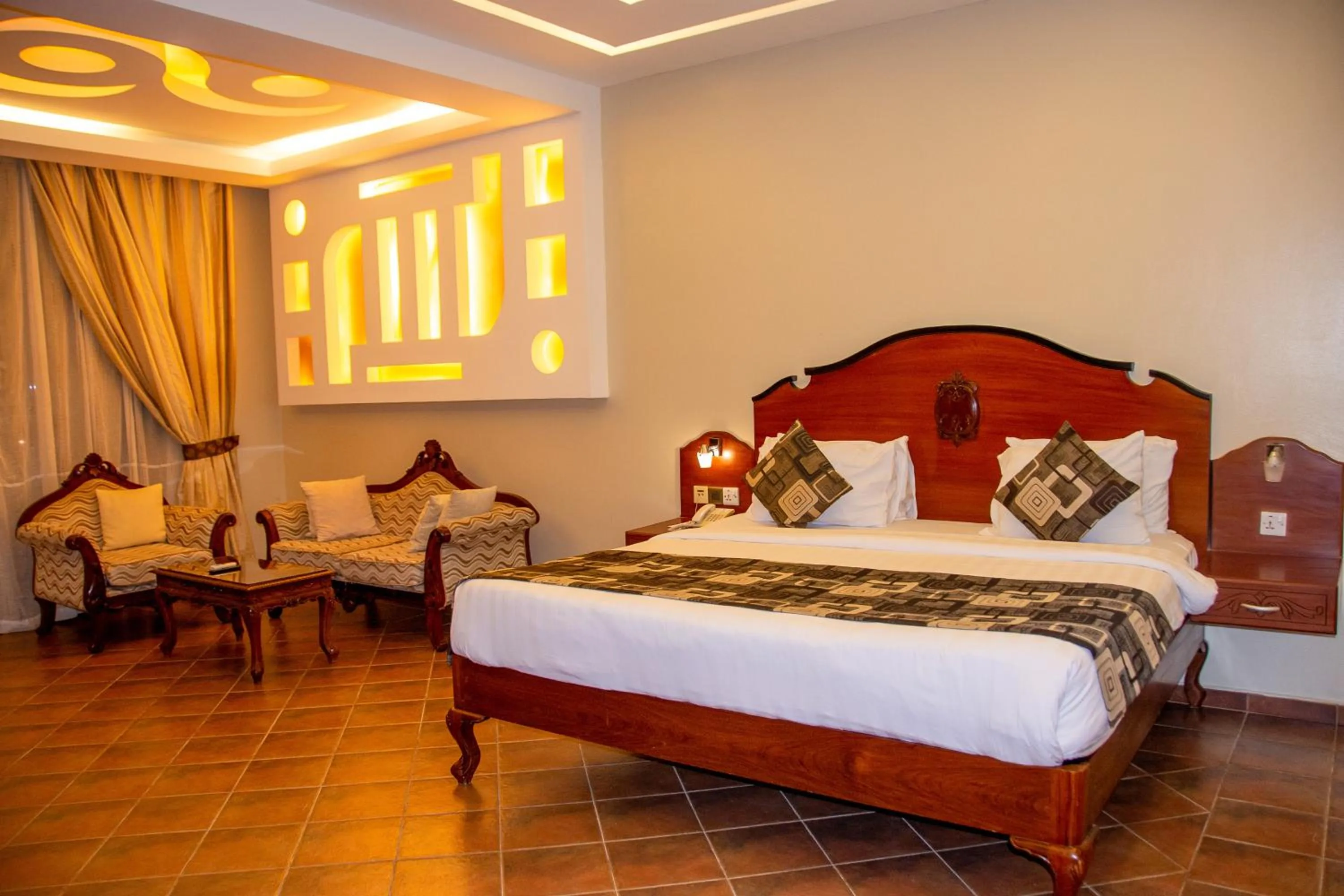 Bed in Malaika Beach Resort