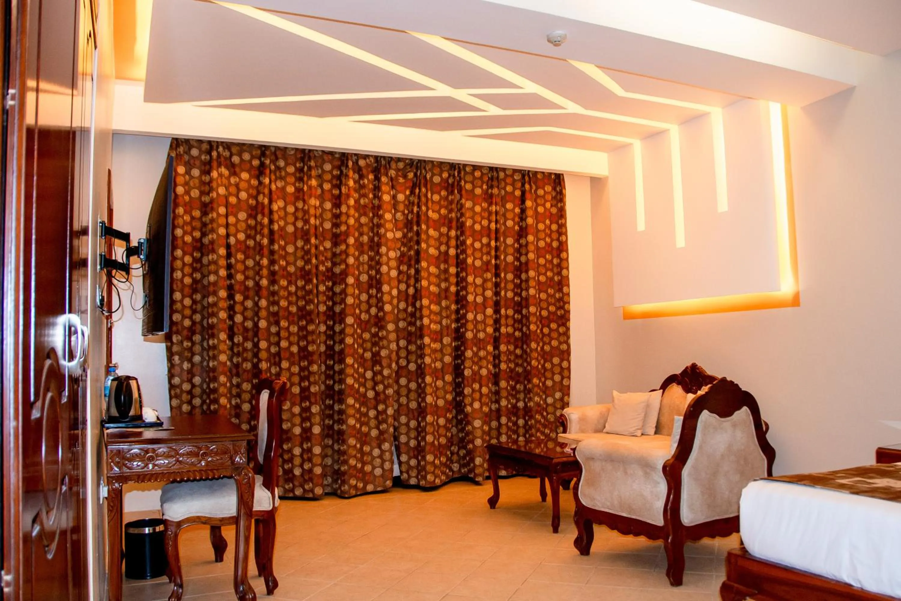 Bed in Malaika Beach Resort