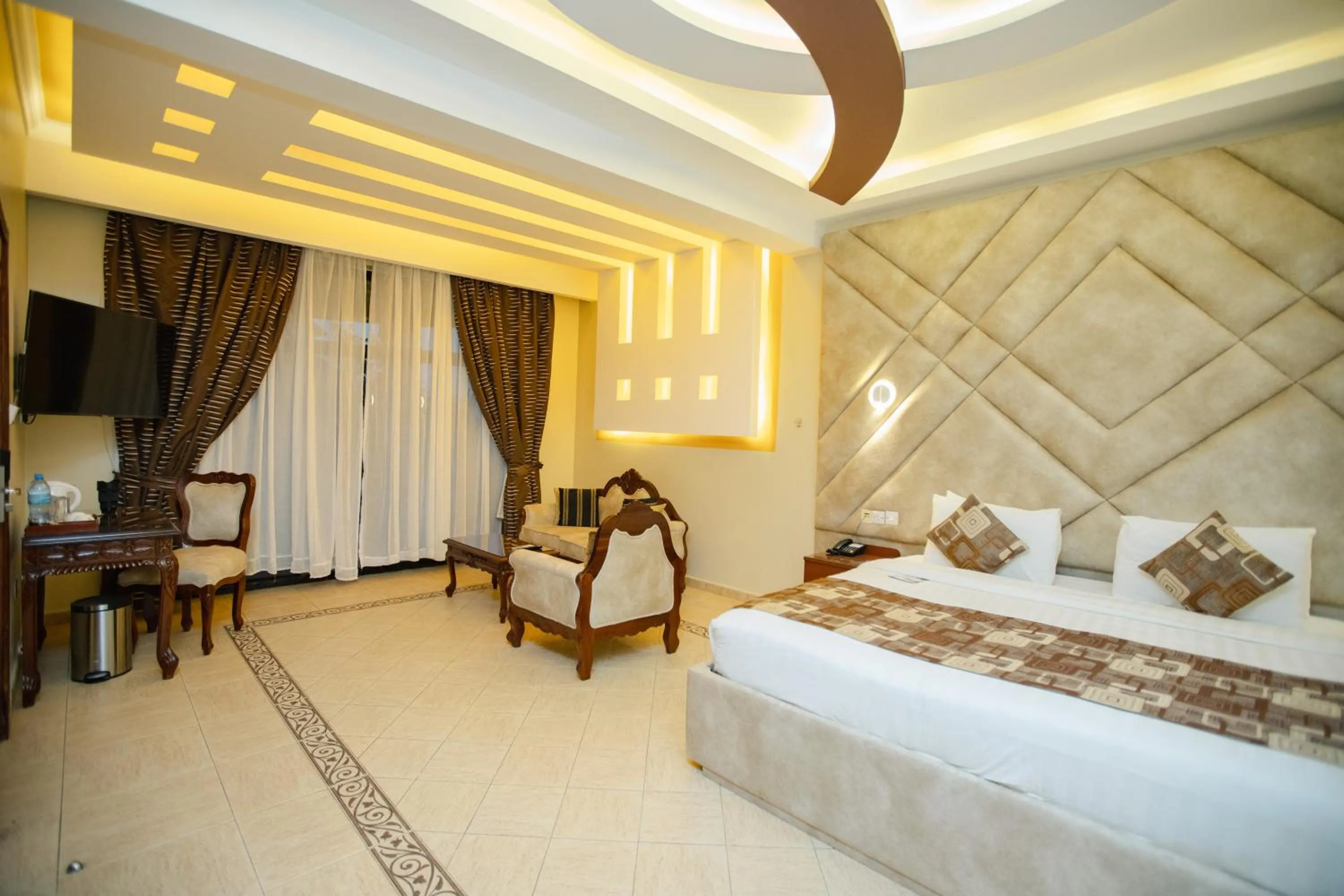 Bed in Malaika Beach Resort