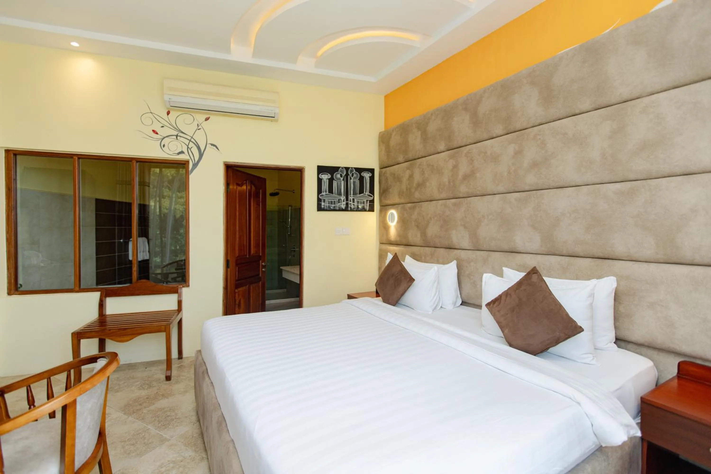 Bed in Malaika Beach Resort