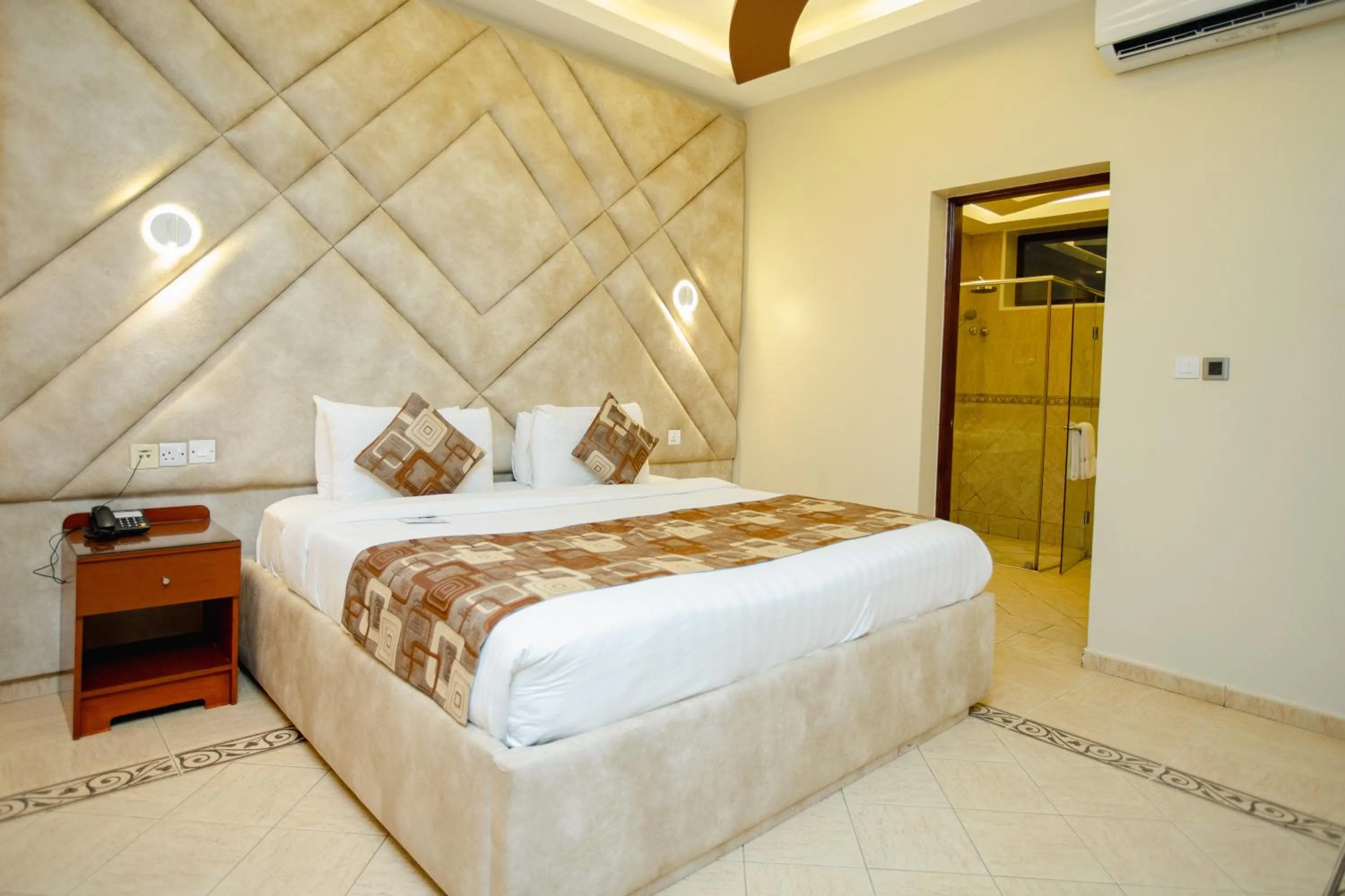 Bed in Malaika Beach Resort