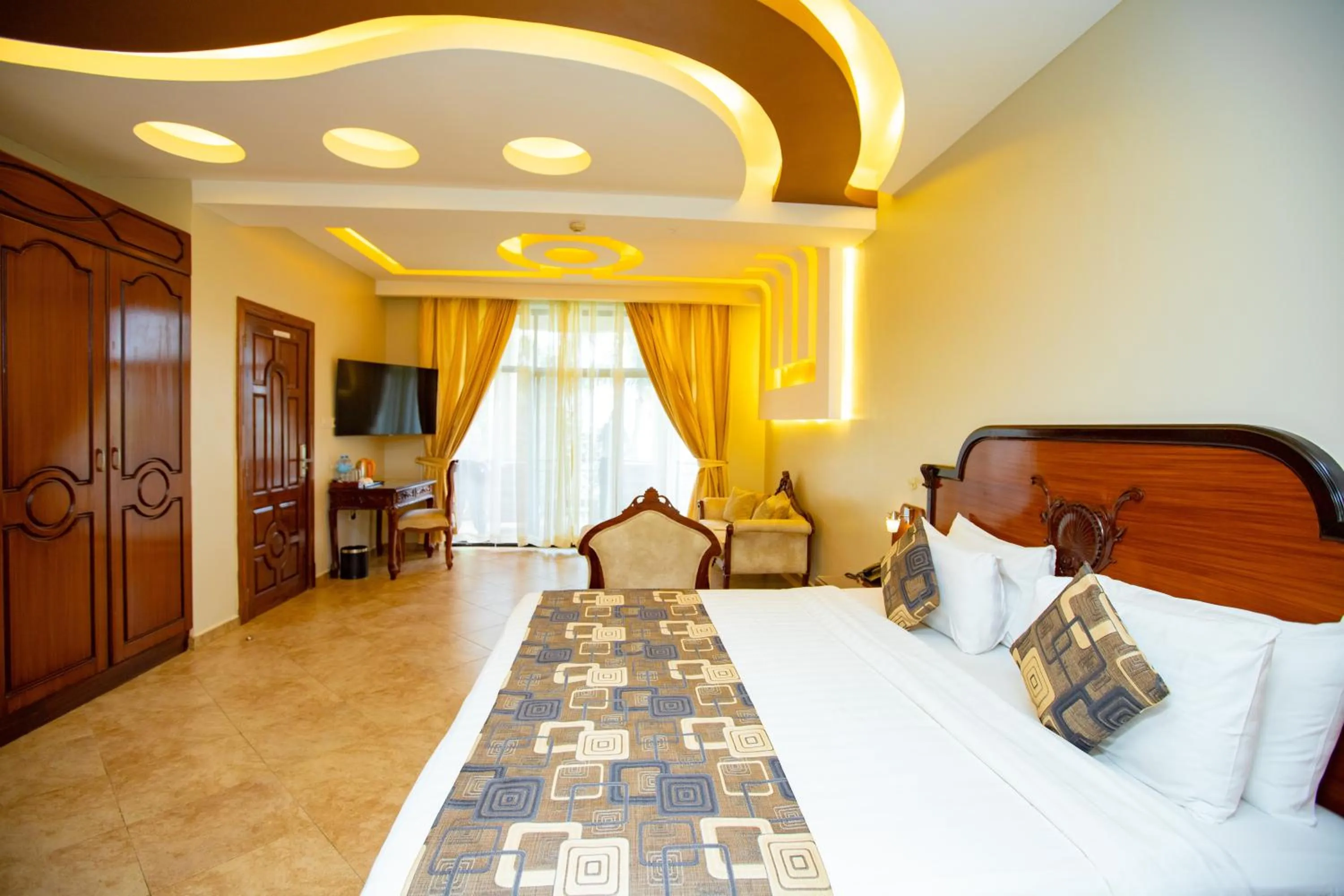 Bed in Malaika Beach Resort