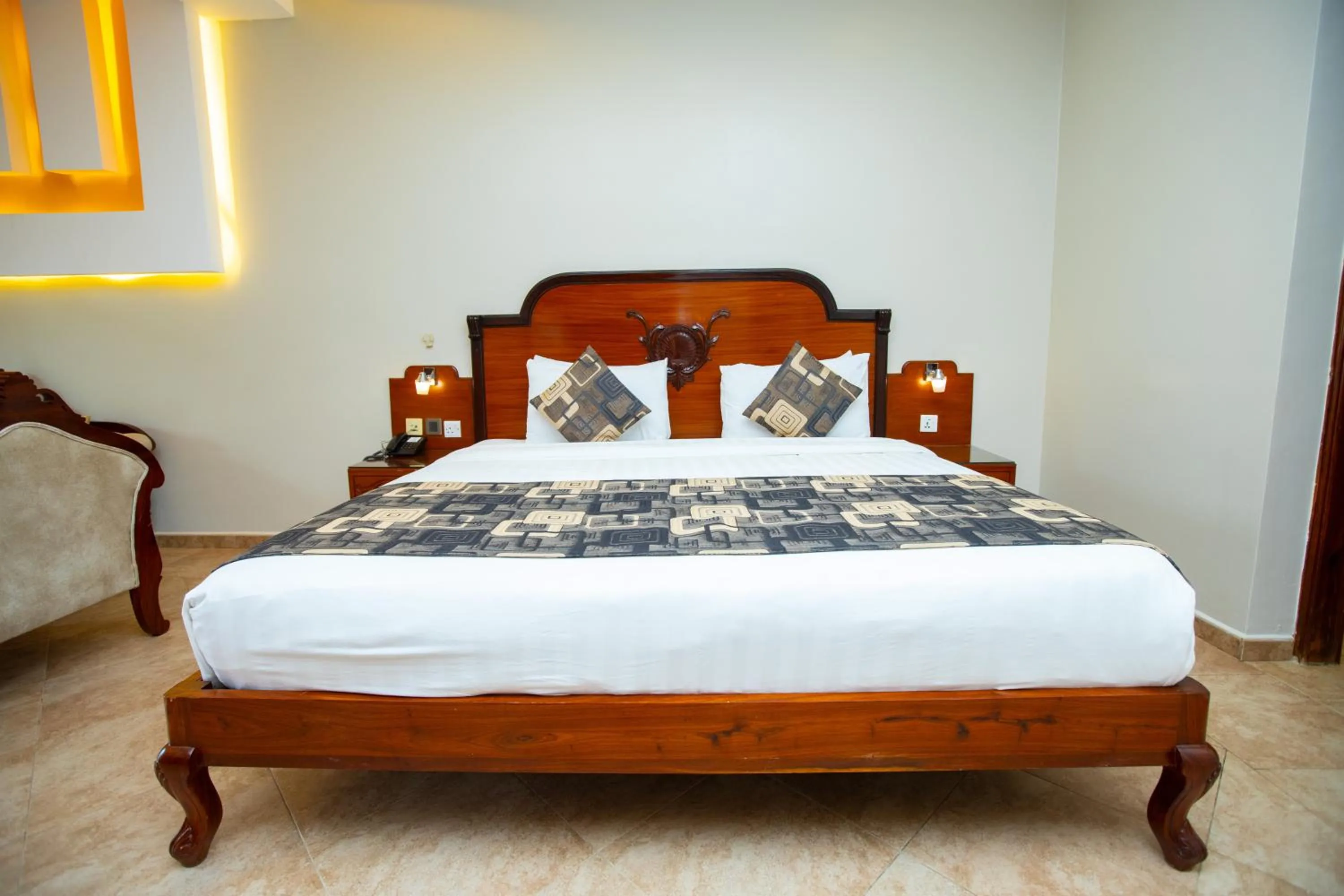 Bed in Malaika Beach Resort