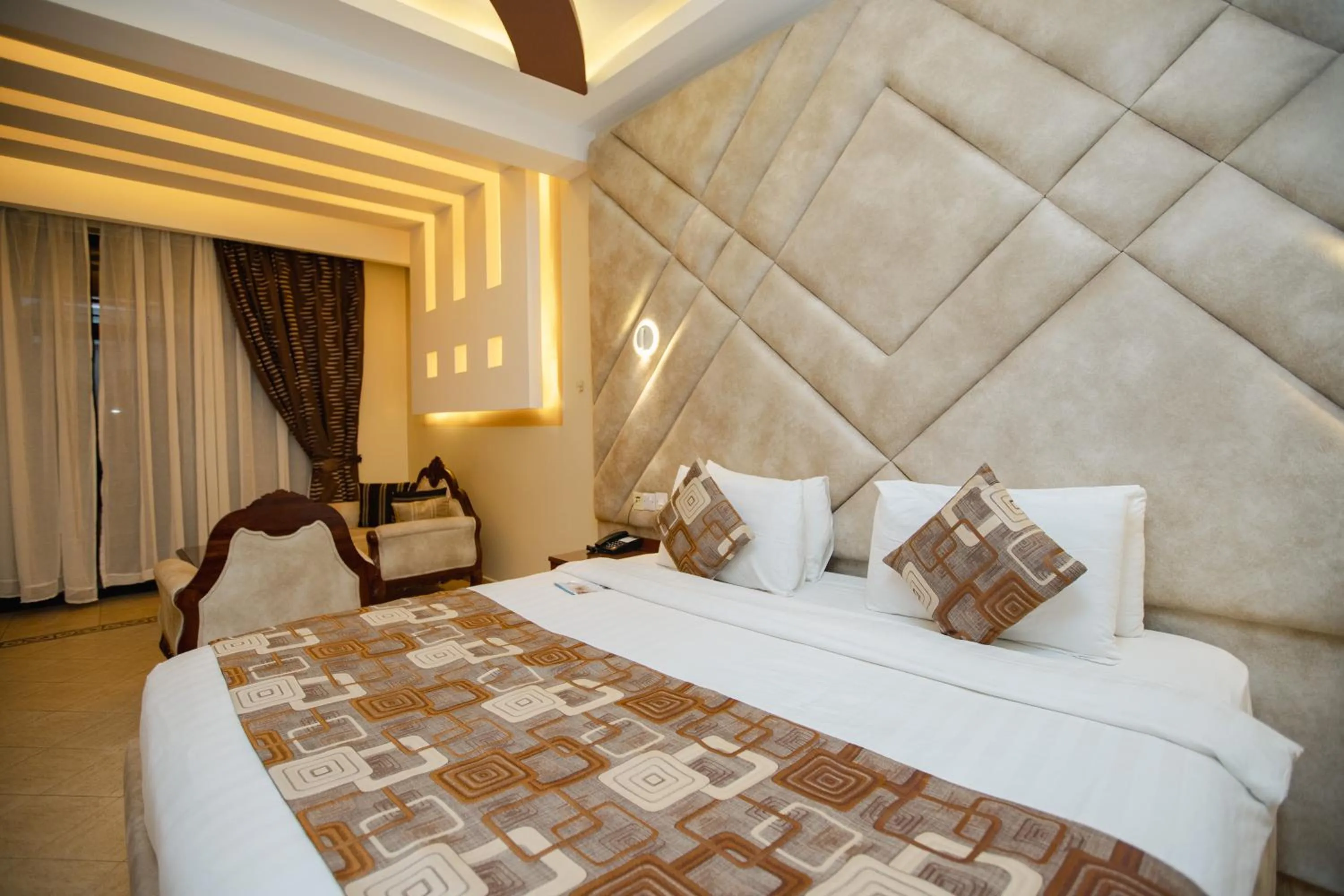 Bed in Malaika Beach Resort