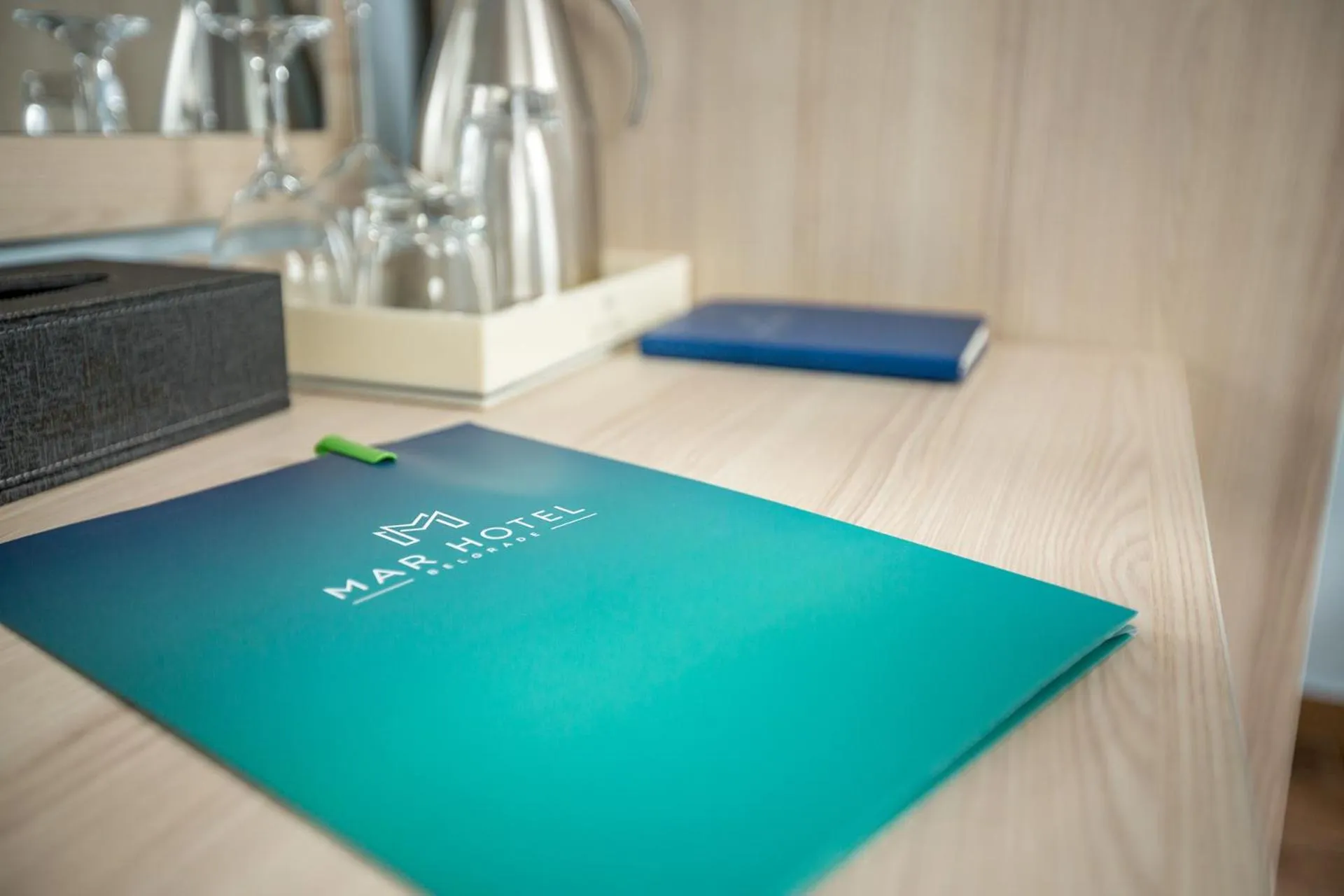 Property logo or sign in Hotel Mar Garni