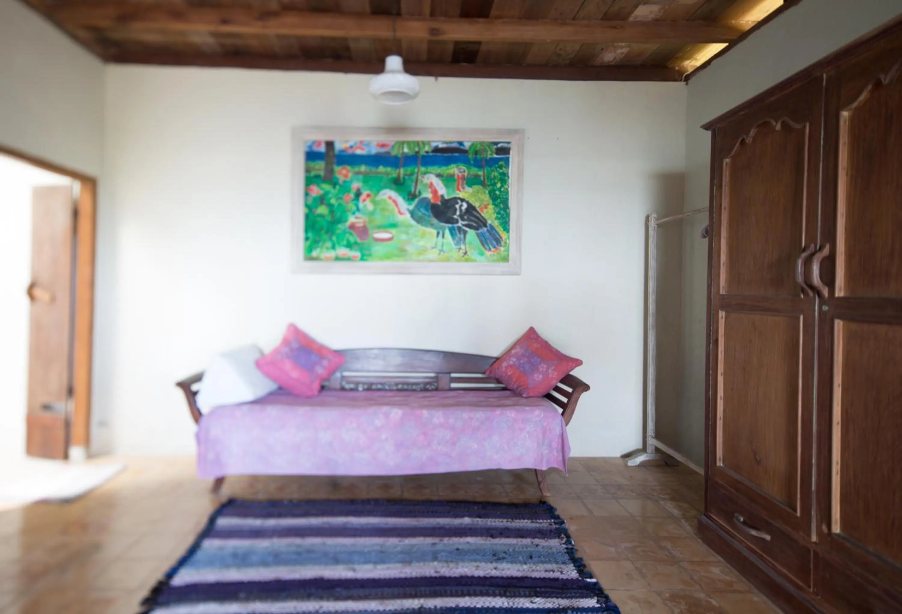 Living room, Bed in Pondok Pisang Candidasa