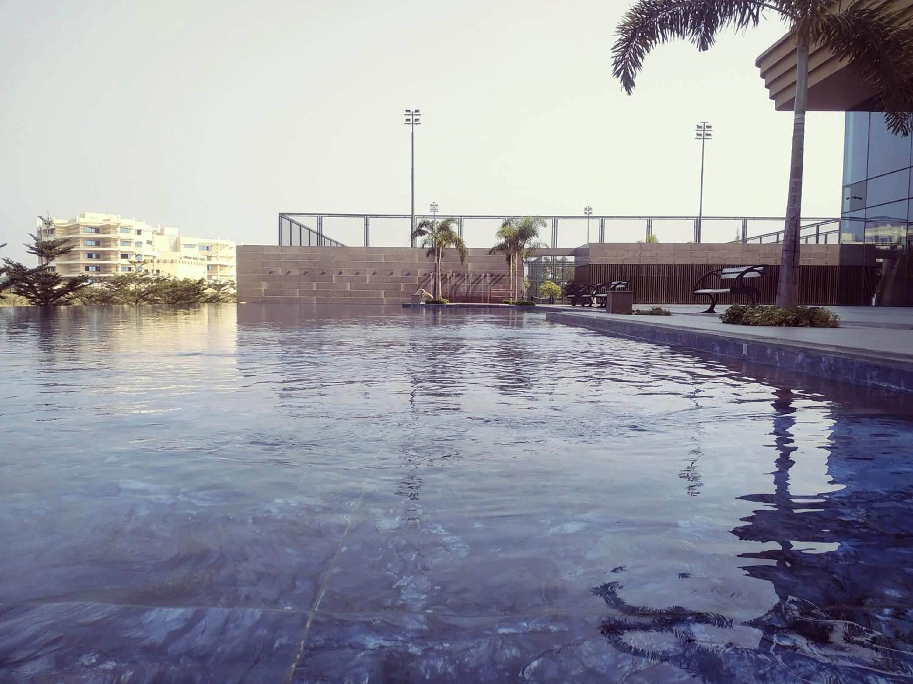 Pool view in Gift City Club, a member of Radisson Individuals