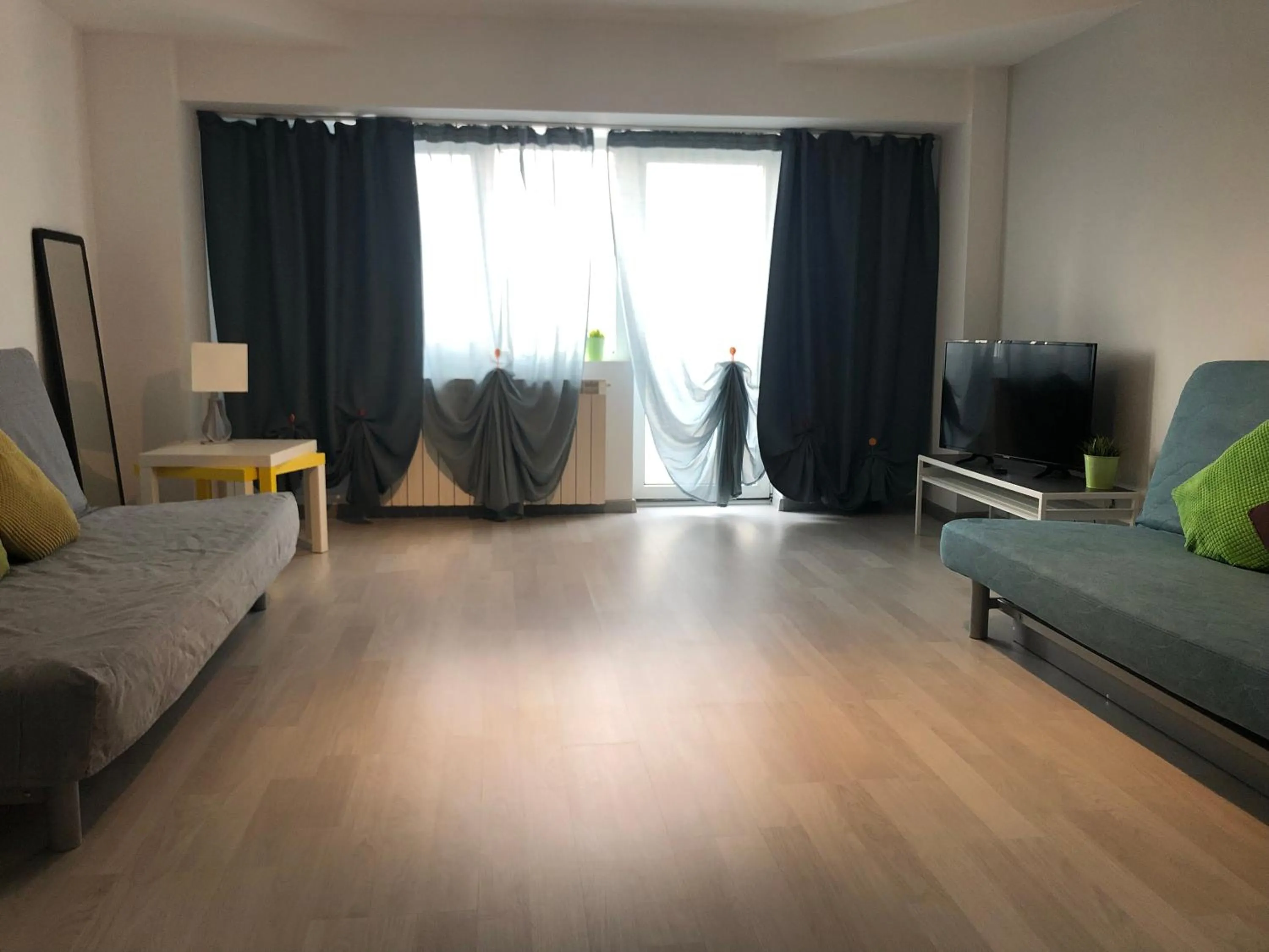 Living room, Bed in Green Apartment 63