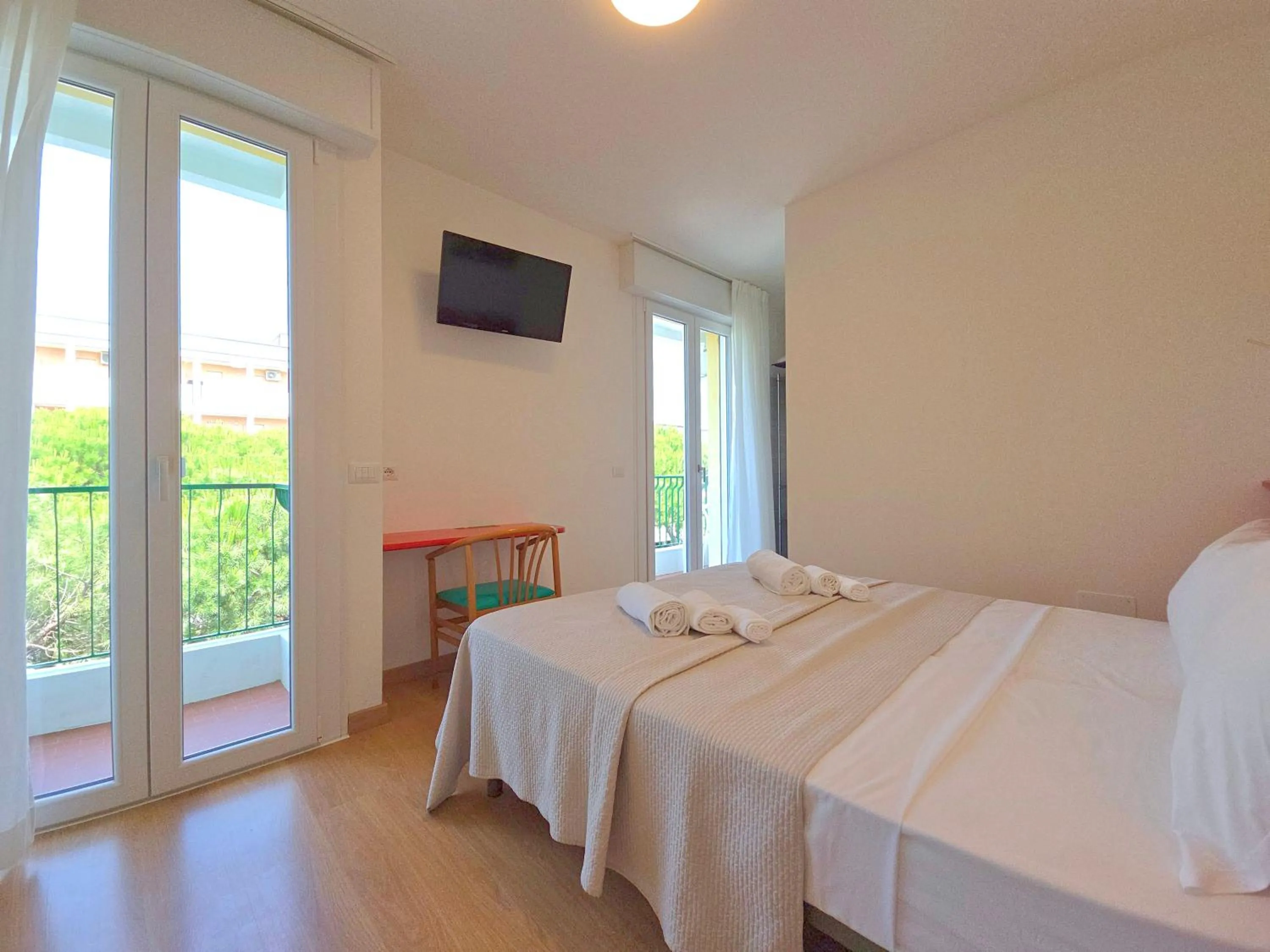 Bed in Hotel Royal Garnì