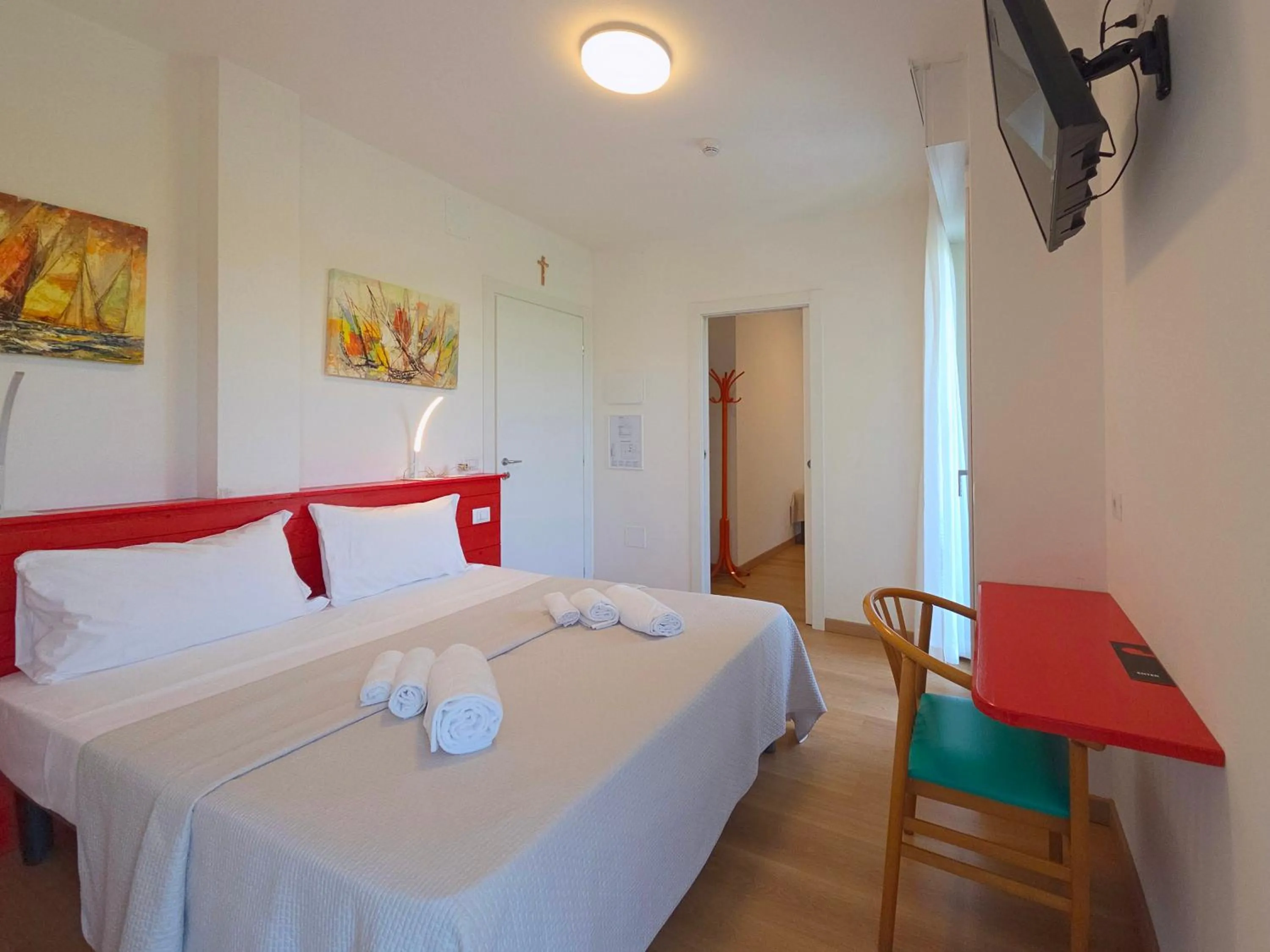 Bed in Hotel Royal Garnì