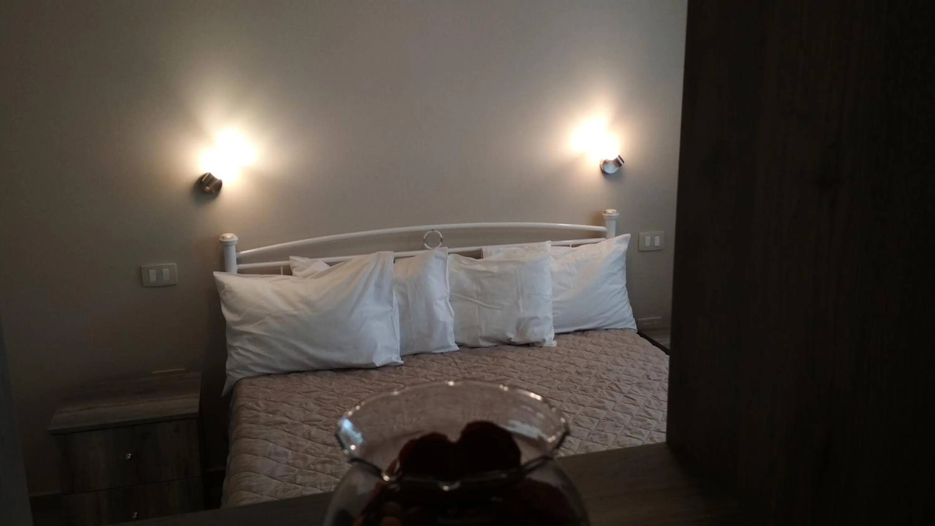 Bed in Casa De Rosa Apartments & Studios