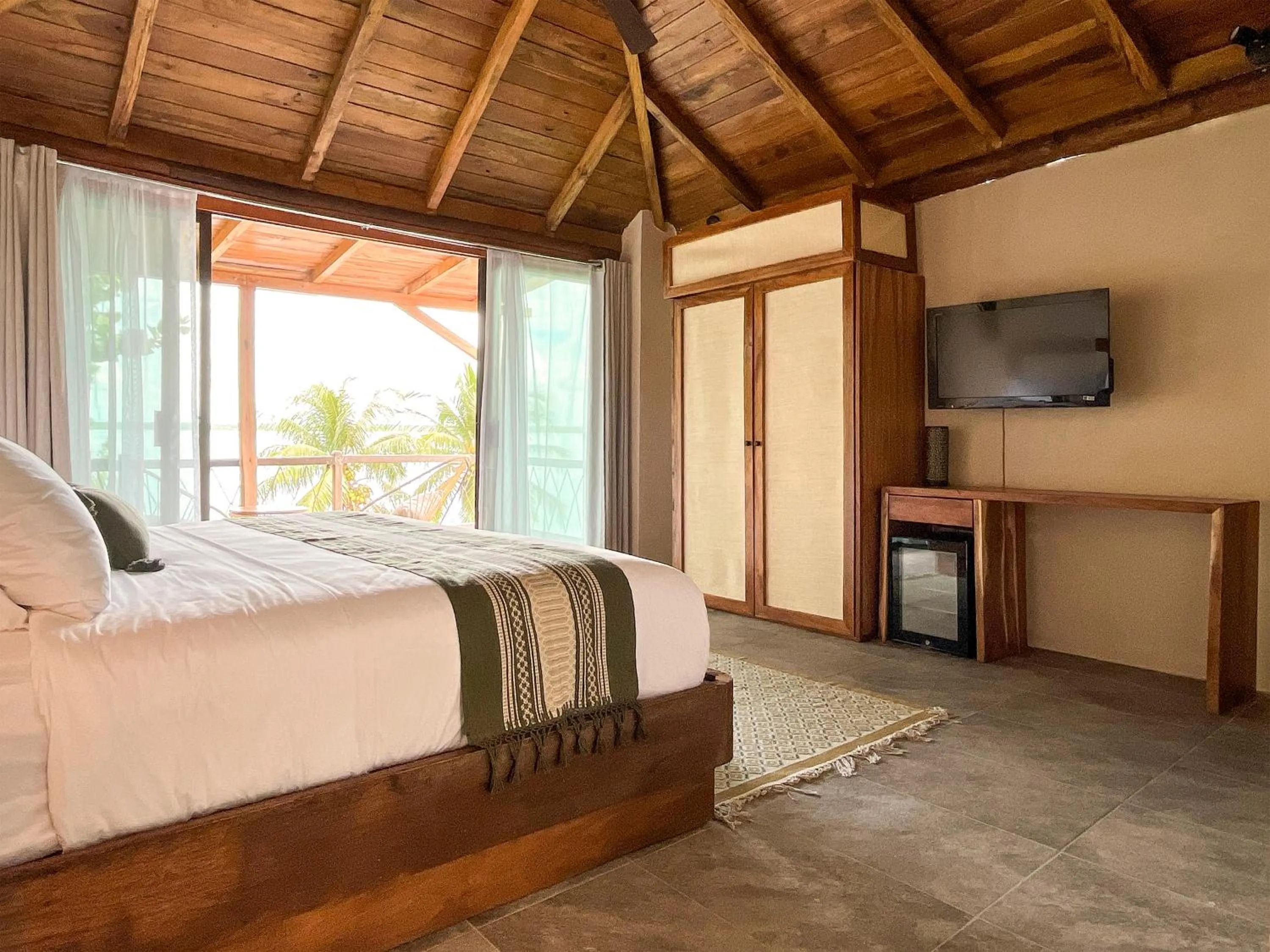 Bedroom, Bed in Zelune Luxury Lagoon Resort Bacalar - Adults Only