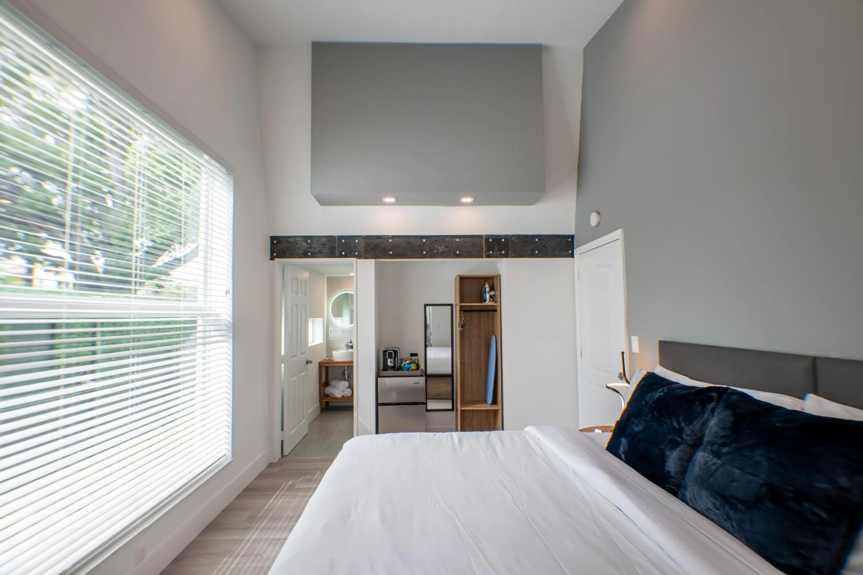 Bed in The Lauderdale Boutique Hotel