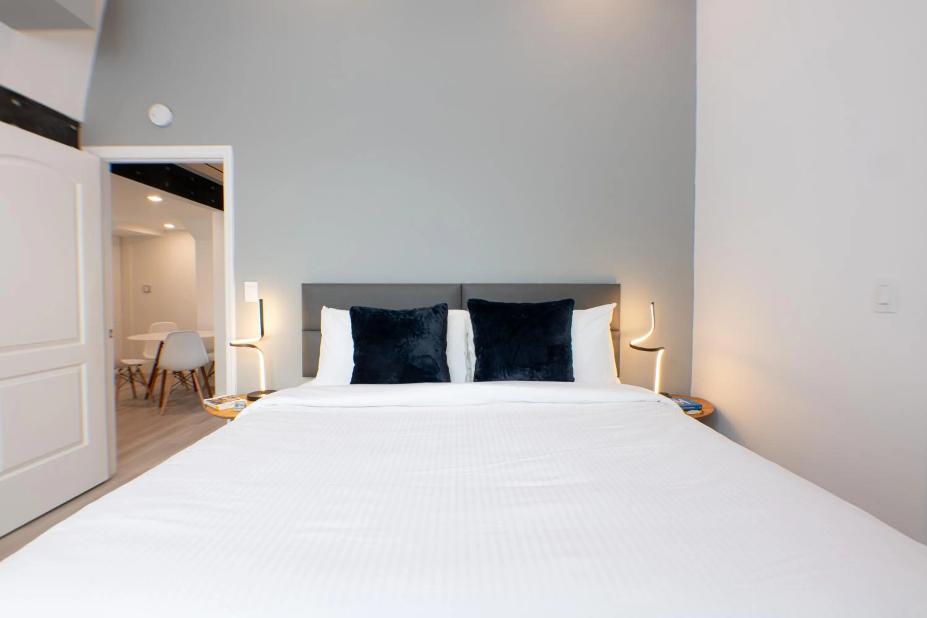 Bed in The Lauderdale Boutique Hotel