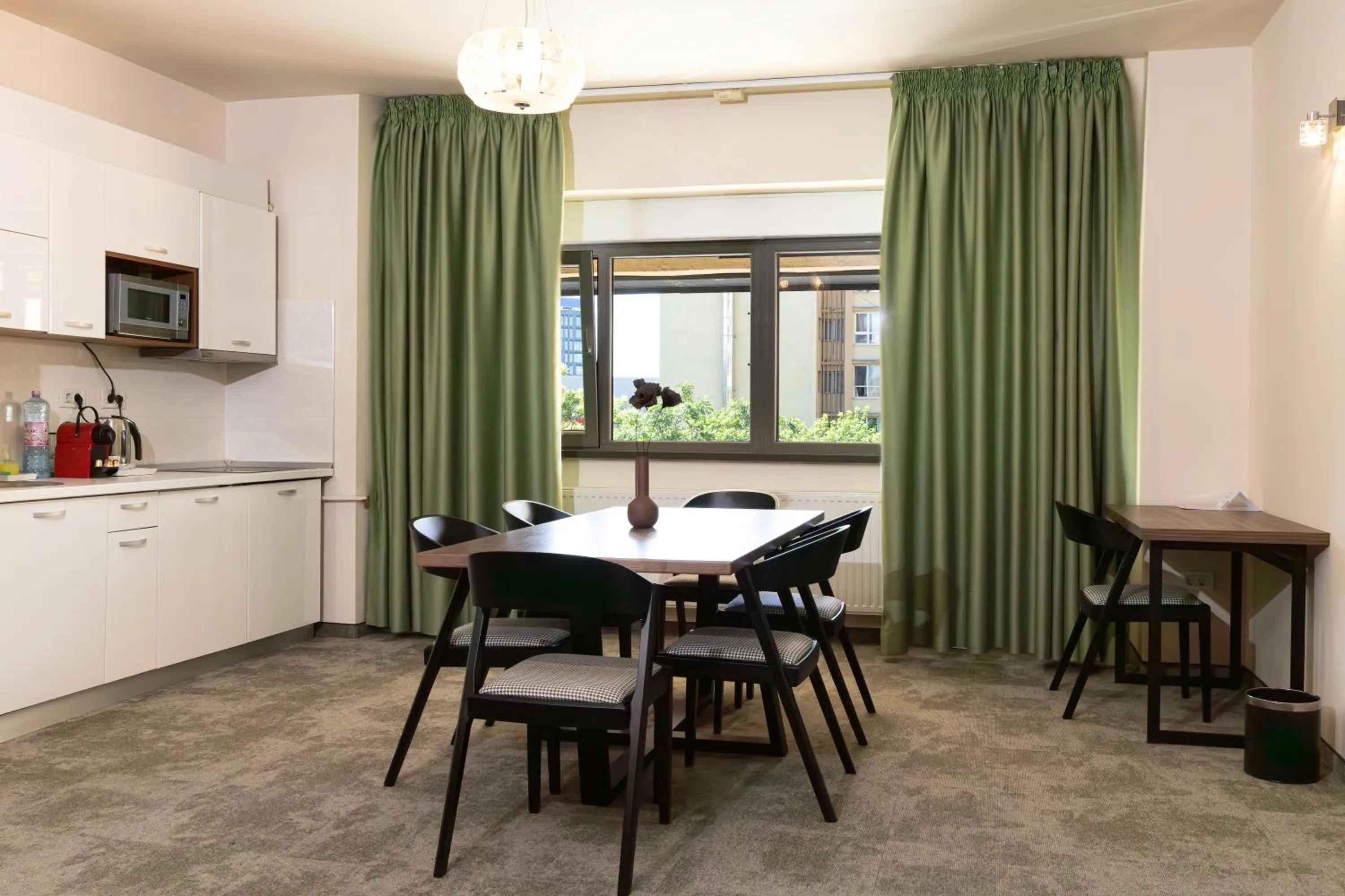 Kitchen or kitchenette in Orhideea Residence & Spa