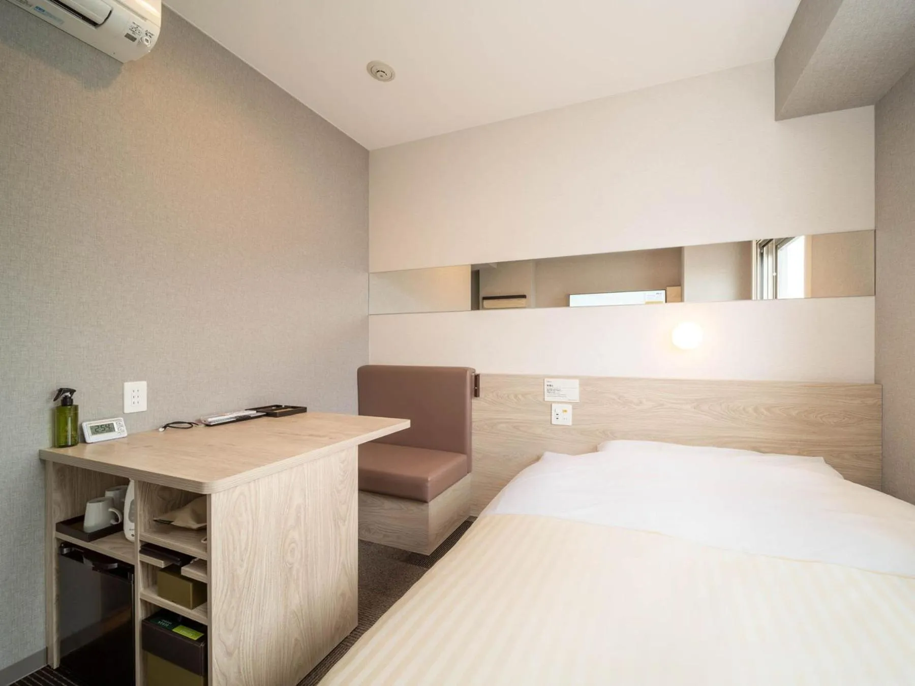 Bed in Super Hotel Premier Obihiro Ekimae