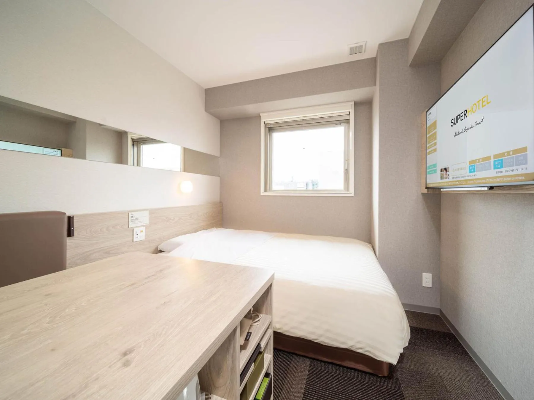 Bed in Super Hotel Premier Obihiro Ekimae