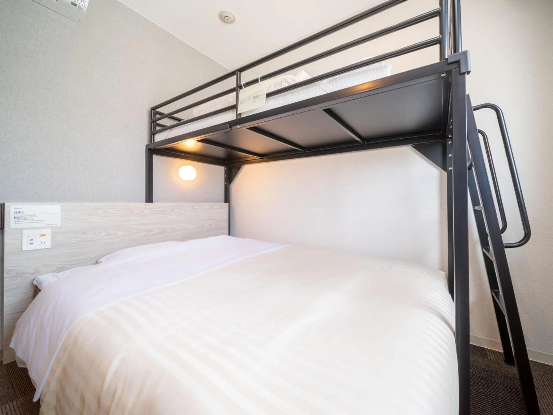 Bed in Super Hotel Premier Obihiro Ekimae