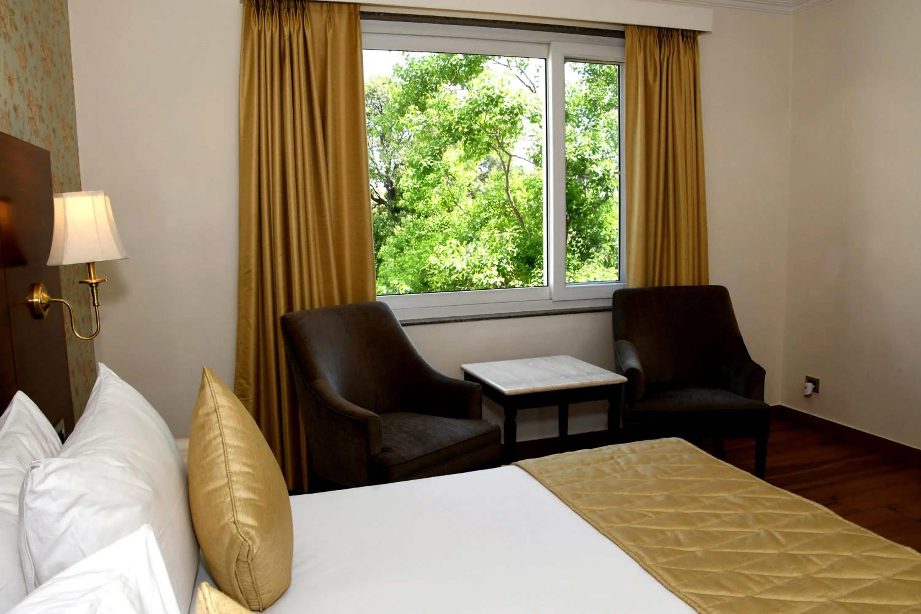 Photo of the whole room, Bed in Mastiff Villa Camellia by OTHPL