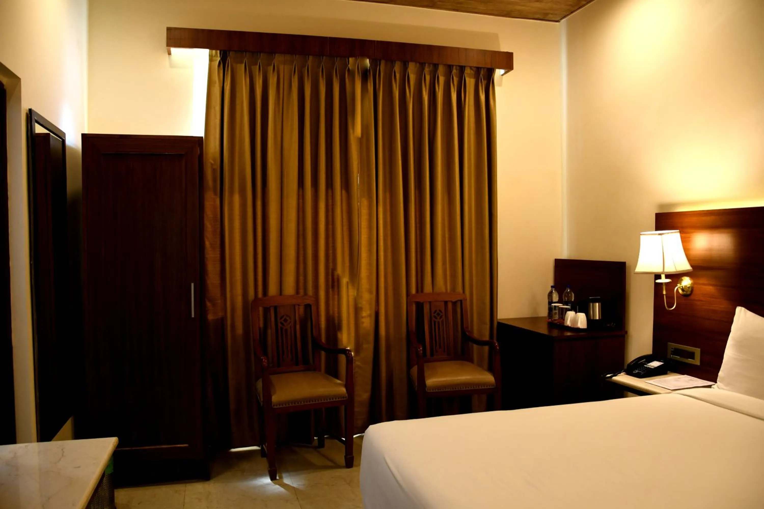 Photo of the whole room, Bed in Mastiff Villa Camellia by OTHPL