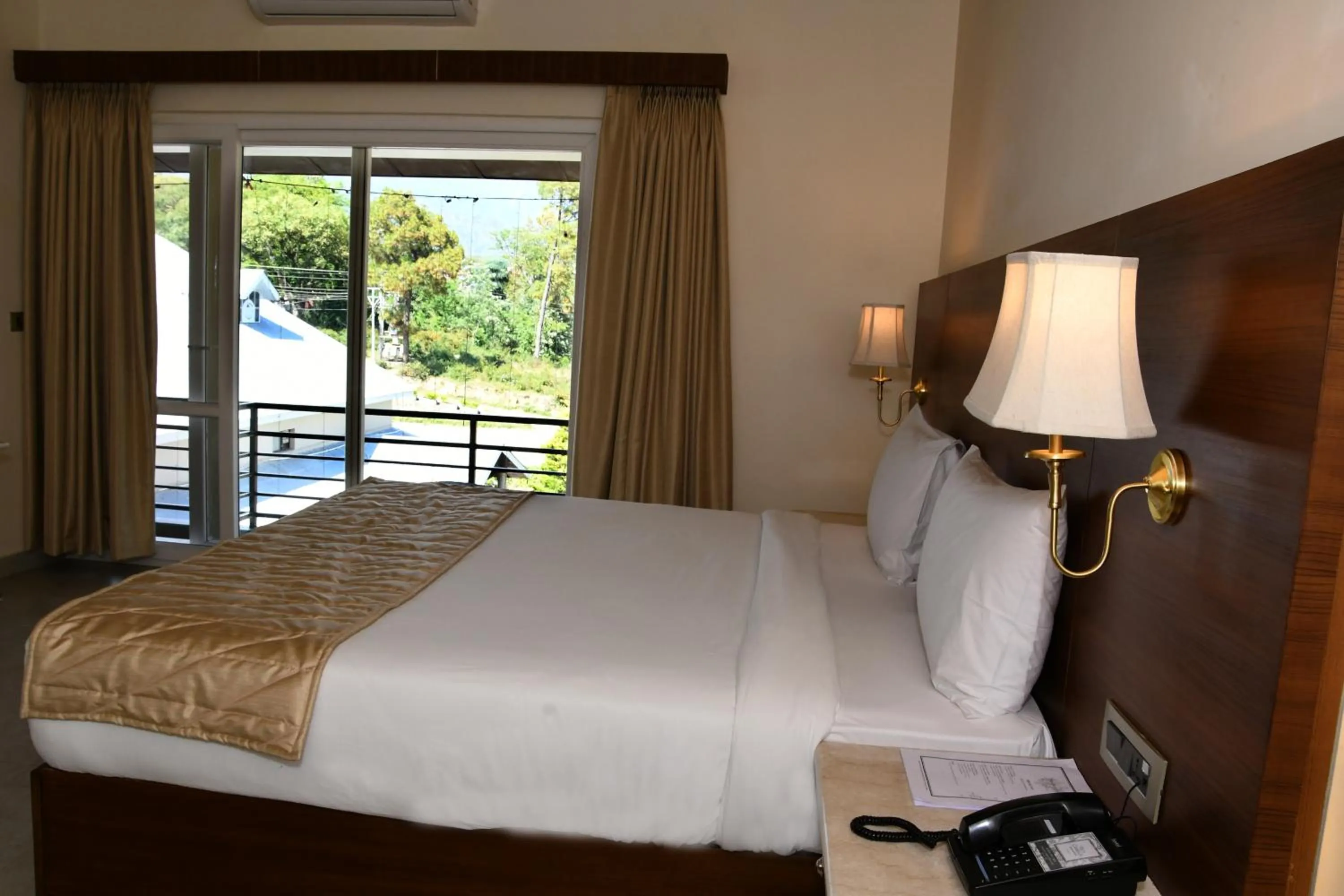 Photo of the whole room, Bed in Mastiff Villa Camellia by OTHPL