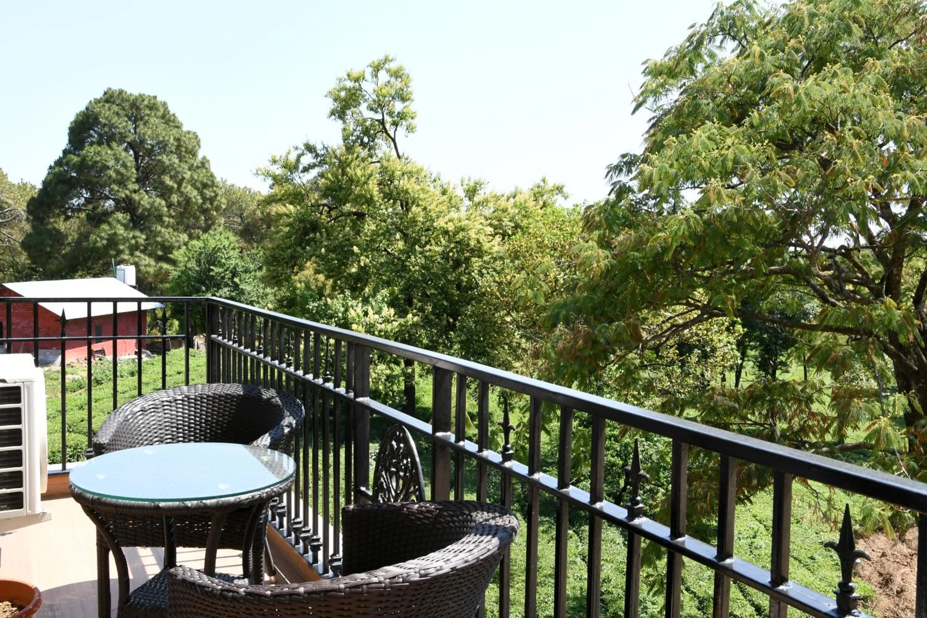 Balcony/Terrace in Mastiff Villa Camellia by OTHPL
