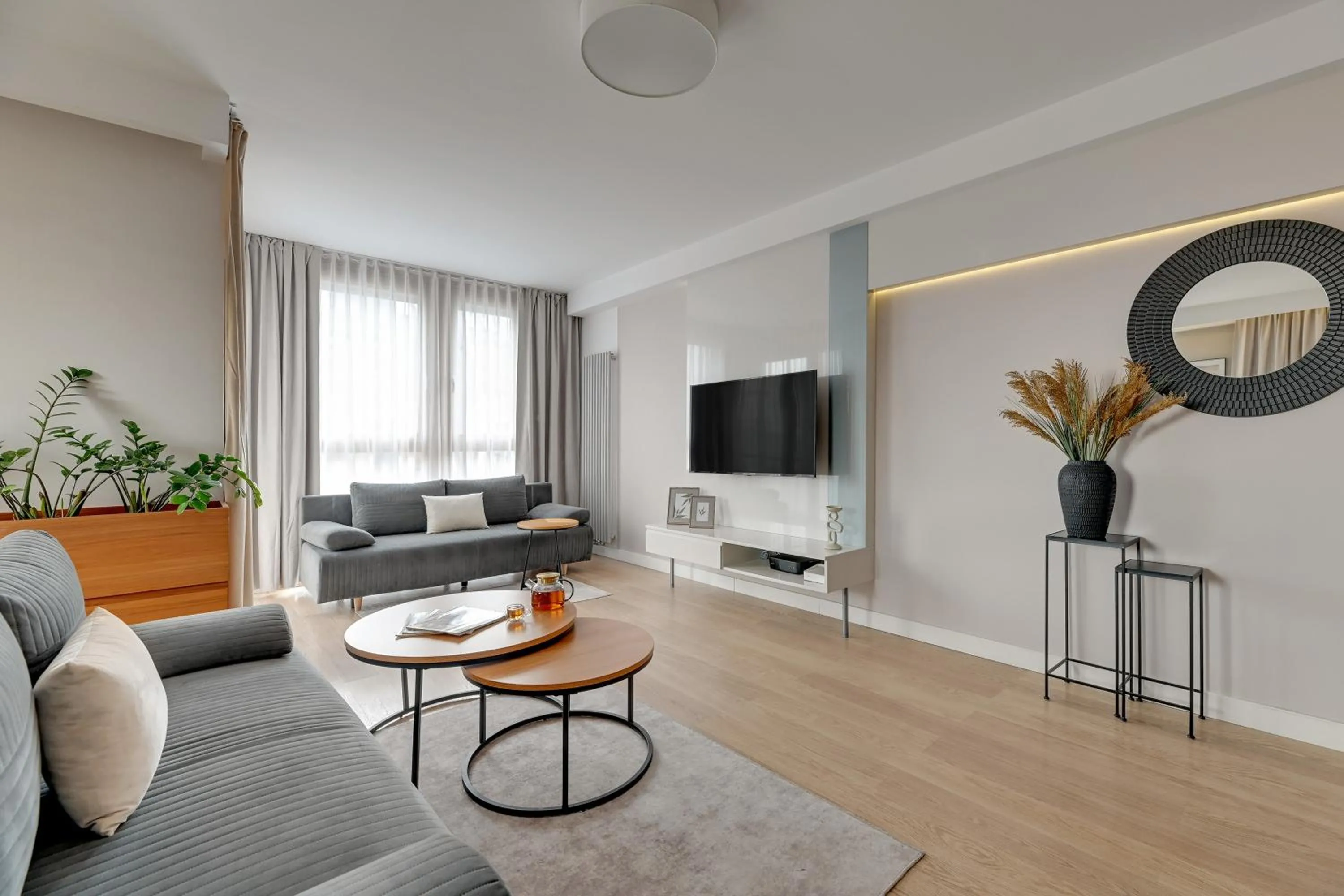 Communal lounge/ TV room in Aura - Riverside & Parking by Downtown Apartments